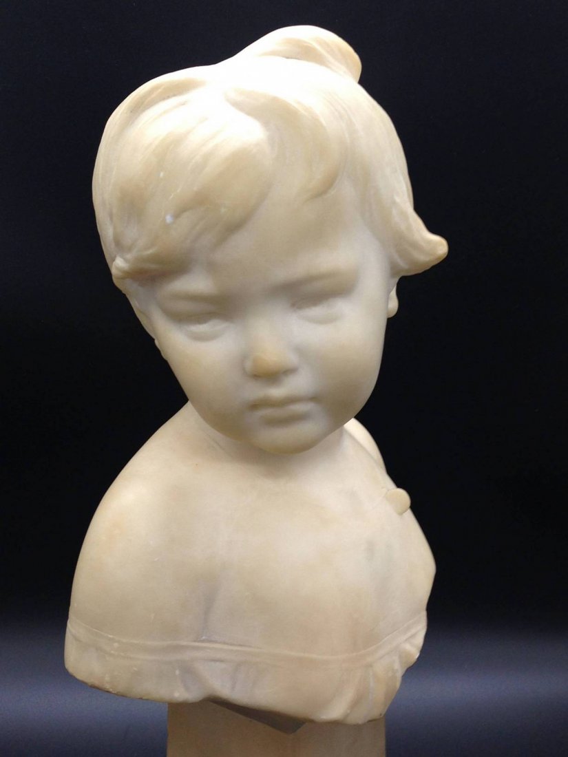 Rare Vittorio Caradossi Bust of a Beautiful Young Lady: This Museum Quality Vittorio Caradossi bust stands around 15 inches tall and truly shares with you the emotion of the subject. The piece is signed on the back T. Caradossi Firenz. The statue, which is