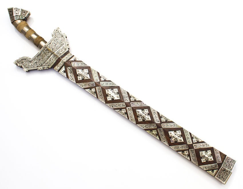 KRIS SWORD, PHILIPPINES MORO MOTHER OF PEARL: Beautiful Moro kris has a very good blade, the hilt and scabbard are finely inlaid with mother of pearl. Publications: Frey, Edward. "The Kris: Mystic weapon of the Malay world." New York: Oxford U