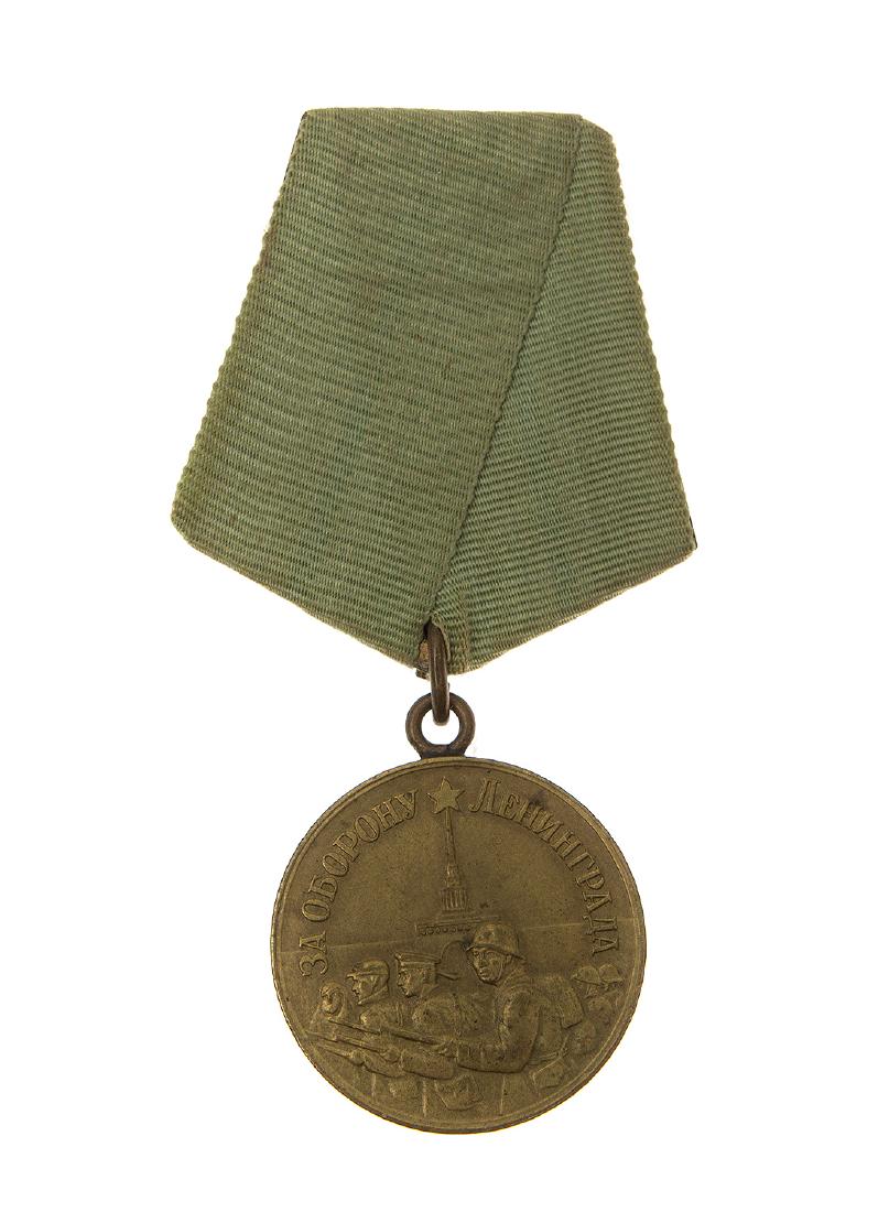GROUP OF SOVIET RUSSIAN DEFENCE MEDALS: 1) Medal for the Defense of Leningrad, Var. 1, 1940s issue, original suspension device, and original faded ribbon. 2) Medal for the Defense of Moscow, Variation 1, 1940s, the suspension device is a la