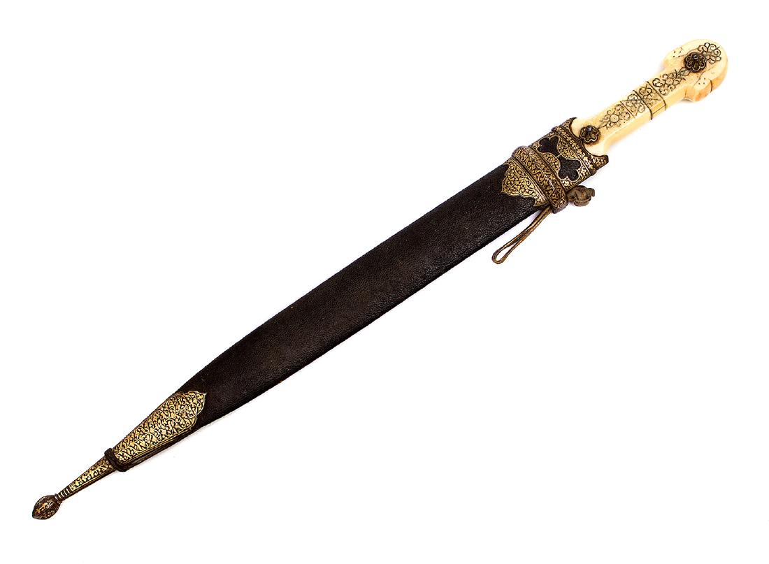 CAUCASIAN DAGGER WITH GOLD INLAY, 19TH C.: Rare Caucasian dagger (Dagestan) with double edged pointy blade decorated with gold inlay with single groove on each side. Hilt is curved of walrus decorated with gold inlay with two gilded steel rive