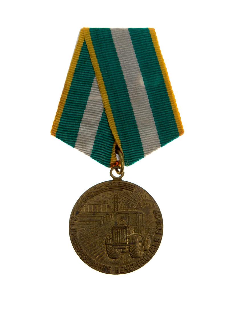SOVIET MEDAL FOR DEVELOPMENT OF NON-BLACK EARTH REGION: This medal was established on September 30, 1977, about 25,000 medals were issued.