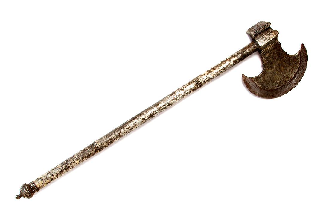 INDIAN TABARZINE SADDLE AXE WITH DAGGER, 19TH C.: Nice silver-plated Indian tabarzine saddle axe with dagger screw in the shaft. Sharp curved edge decorated with silver inlaid geometric design, late 19th c.