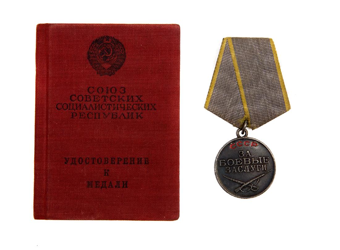 SOVIET MEDAL FOR COMBAT SERVICE: Medal for Combat Service, No.1967231, issued in February 1945, with original award document dated June 18, 1945; in silver.