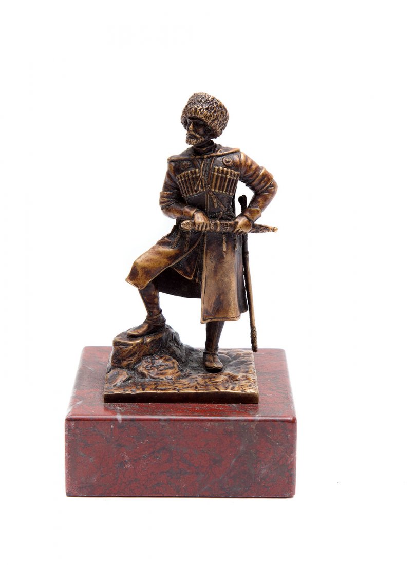 RUSSIAN BRONZE STATUE OF CHECHEN WARRIOR SHAMIL: Russian bronze statue of the 19th century Chechen leader Imam Shamil. The bronze figure shows nice patina. The statue stands on the marble base. Height: 6 in., 15 cm. including base.