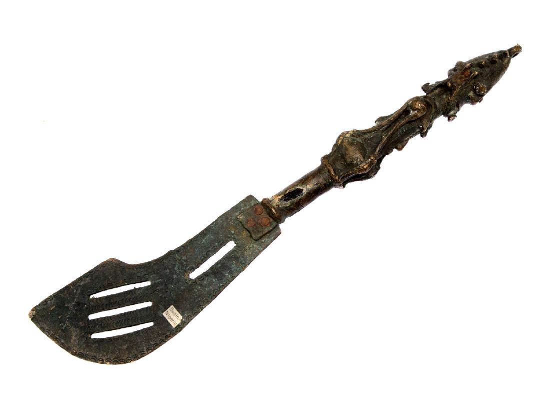 NIGERIAN SOLID CAST BRONZE CEREMONIAL DAGGER: Nigerian bronze ceremonial dagger, early to mid 20th century from the a Nigerian tribe of Africa. Cast in solid bronze (copper-brass alloy) with integral curved pierced blade. The hilt features two ba