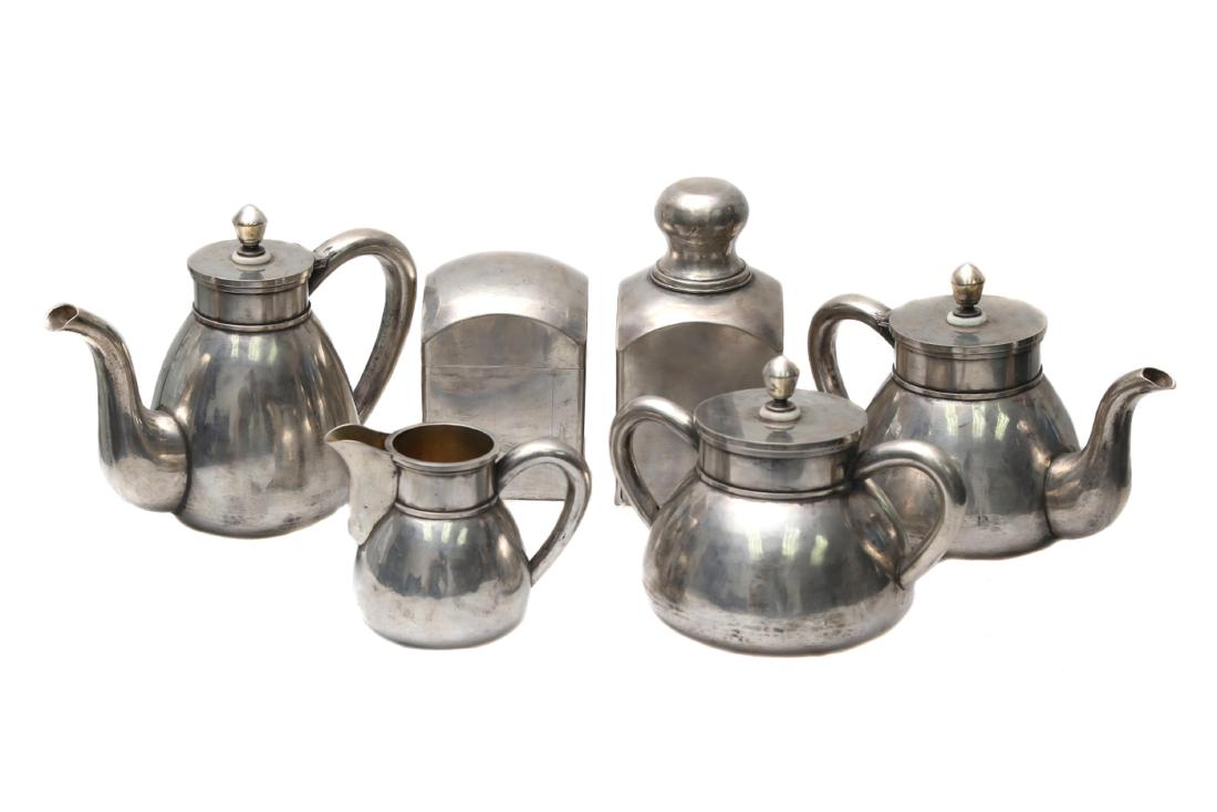 RUSSIAN IMPERIAL SILVER 6 PIECE SET BY GRACHEV: A rare tea and coffee set, each piece (except coffee pot) is gold washed inside, hallmarked "84" and "B.C. 1886" Grachev Brothers (in Cyrillic). Total weight: 85.25 oz., (2.42 kg.) Dimensions: Tea Pot