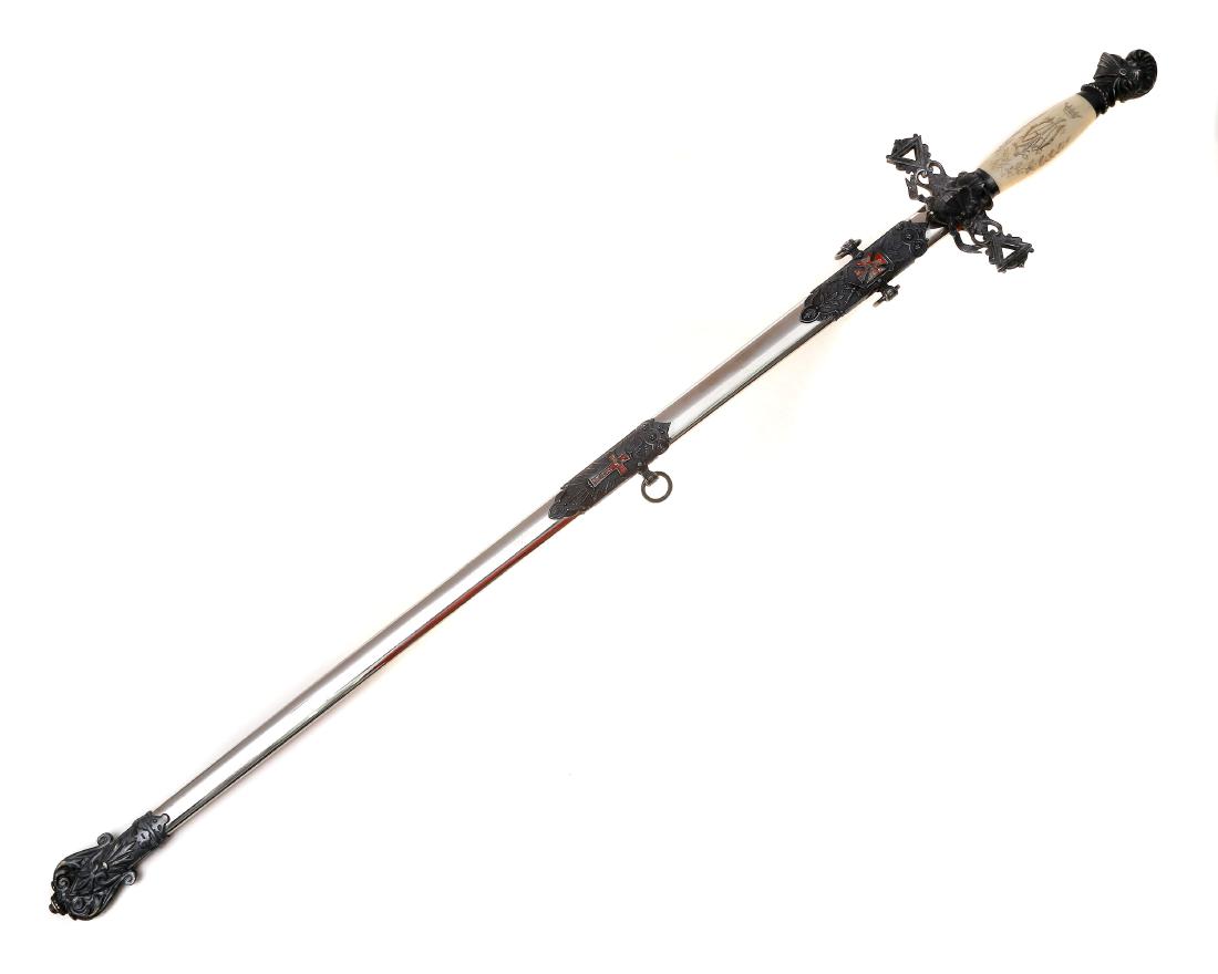 MASONIC SWORD ORDER OF TEMPLAR, GILT BLADE: Fraternity Masonic ceremonial Knights Templar sword with gilt chrome blade, cast mounts and elephant grip. Dimensions: L: 37 1/4 in., (95 cm.)