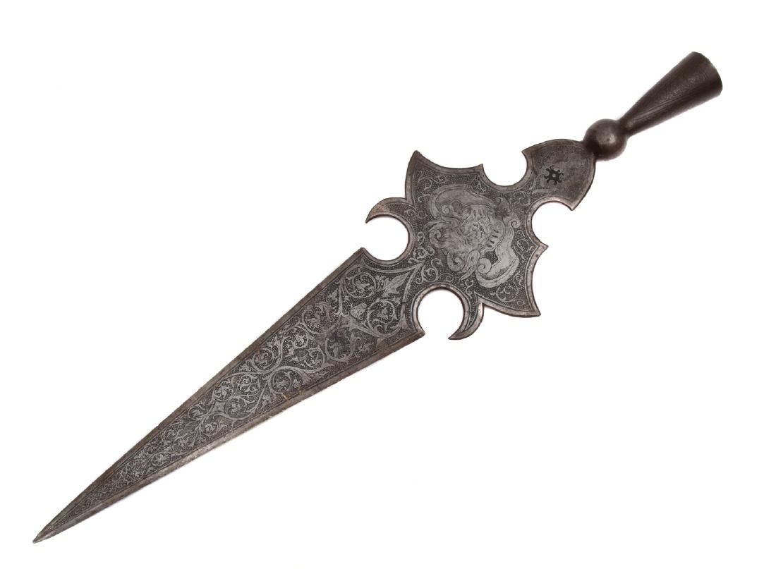 EUROPEAN PARTIZAN POLE ARM: Etched with floral motifs and satyrs on both sides, with unidentified armorer's mark. Dimensions: L: 26 5/8 in., (68 cm.)