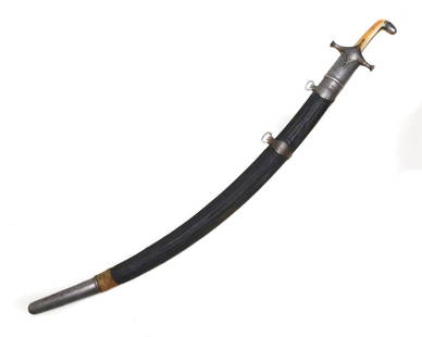 ISLAMIC PERSIAN SHAMSHIR SWORD W. DAMASCUS BLADE: With beautiful Damascus steel blade with yalman this Persian shamshir sword features steel cross guard and fittings, characteristic solid carved grip and wooden leather scabbard covered with original