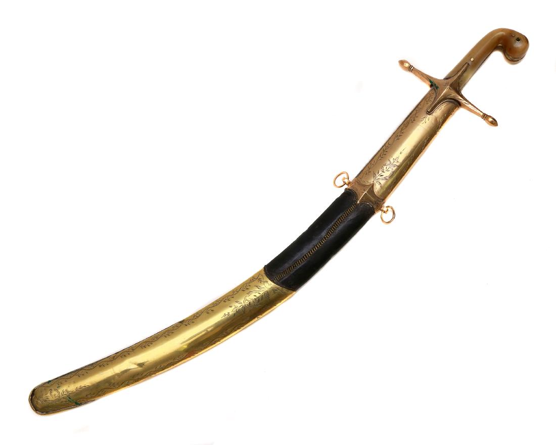 MASSIVE ISLAMIC OTTMAN TURKISH PALA, 19TH CEN.: An Ottoman pala or kilij saber, 19th century. This sword features a curved wide blade with t-spine and yalman, decorated with chiseled and etched design at forte with Arabic inscriptions in gold. The
