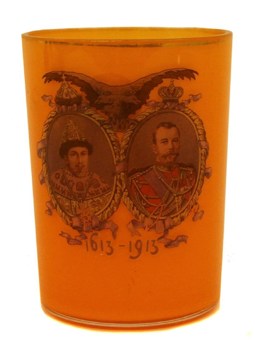 IMPERIAL RUSSIAN GLASS 300 ANNIVERSARY BEAKER: Russia. 1913 by Gusev Crystal Factory, Vladimir Region. Yellow opaque glass with a colorless top overlay. Featuring a decal image depicting the portraits of Mikhail Fedorovich and Nikolai Alexanrovich