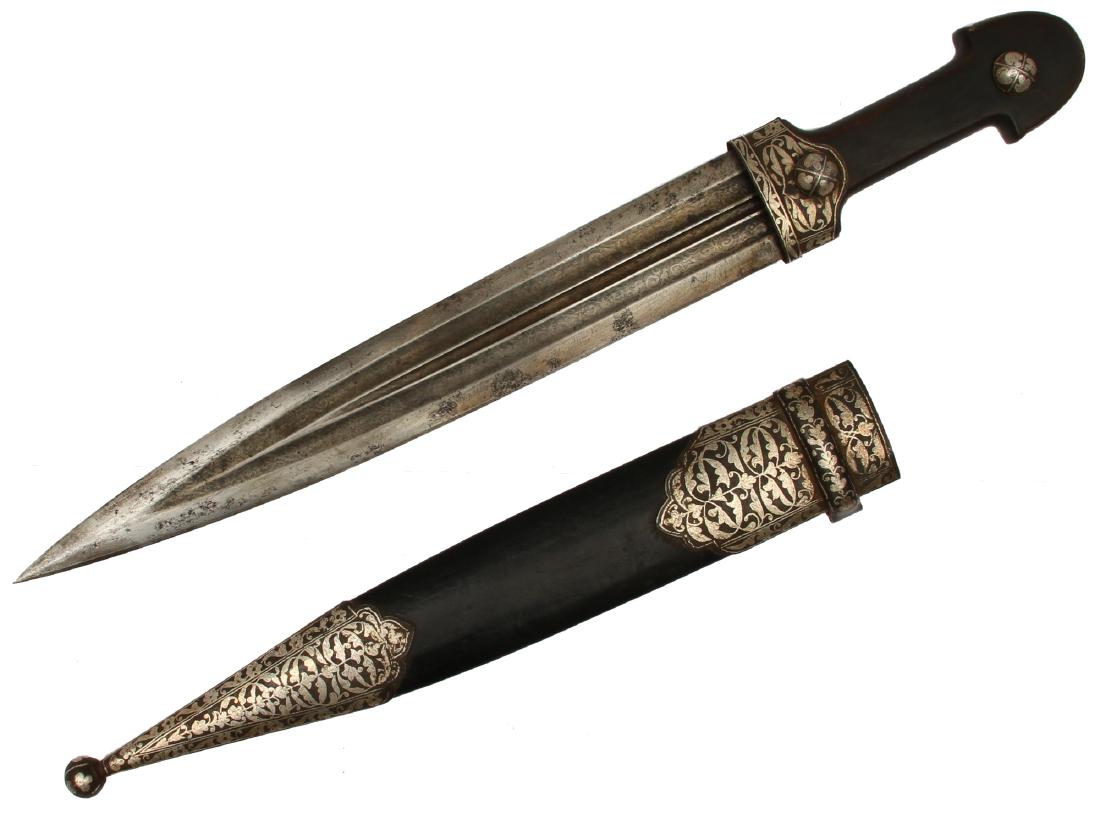 CAUCASIAN GEORGIAN KINDJAL DAGGER: A Georgian dagger with wide double edged blade with maker's mark, horn grip, and steel mounts decorated with niello. Ca. late 19th century. Dimensions: L: 17 in., (43 cm.)