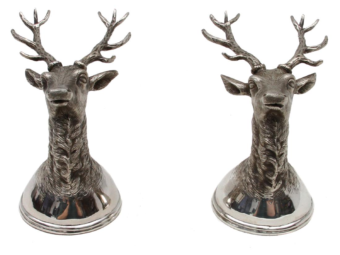 IMPERIAL RUSSIAN SILVER 'STAG' STIRRUP CUPS: A fine set of two Russian gilt silver Stirrup cups modeled as stagâ€™s heads with antlers. Imperial Russian silver hallmarks "PO" with female head looking right and 84 zolotnik. Total weight: 8.1