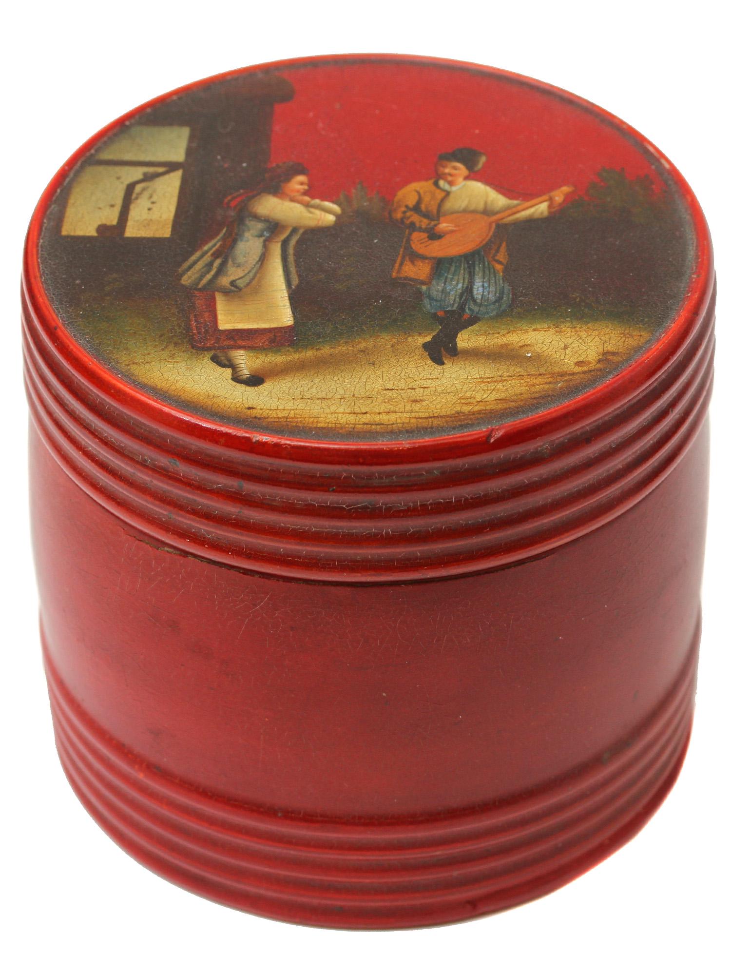 A RUSSIAN LACQUERED BOX TEA CADDY WITH COSSACK: Hand painted barrel shaped Russian papier mache lacquer box or tea caddy, depicting a dancing maiden and cossack playing on lute. Made by Vishnyakov factory, 1880-1890s. Signed on the lid. Dimensions: