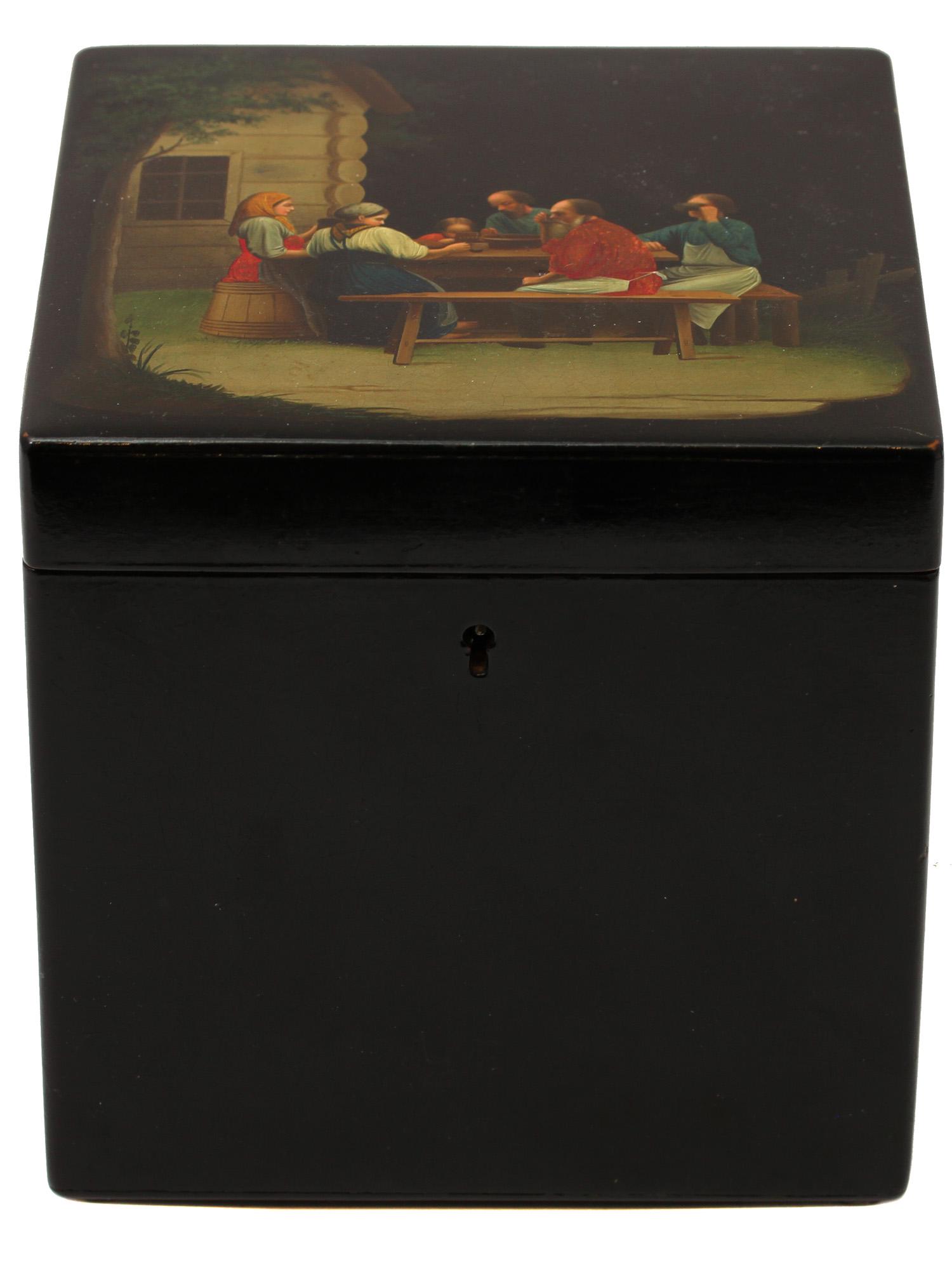 A RUSSIAN LACQUERED BOX OR TEA CADDY: Handcrafted and painted lacquer box, called "The Family Dinner". Paper-mache, tempera and oil lacquer painting. Lukutin Manufactory, Fedoskino, ca. 1880-1902 Illustrated: Russian Lacquered Papier-MÃ�