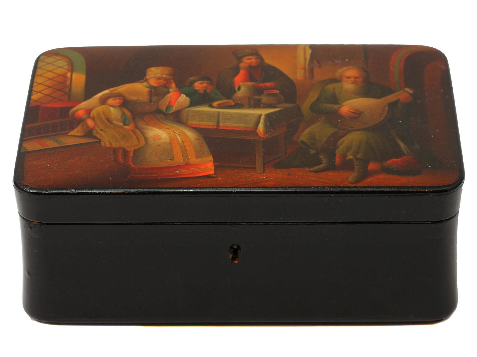 A RUSSIAN LACQUERED BOX DEPICTING MERCHANT FAMILY: Handcrafted and painted lacquer box, portraying a family listening to a travelling musician, playing on lute. Paper-mache, tempera and oil lacquer painting. Made by Vishnyakov factory, 1880s-1890s. Si