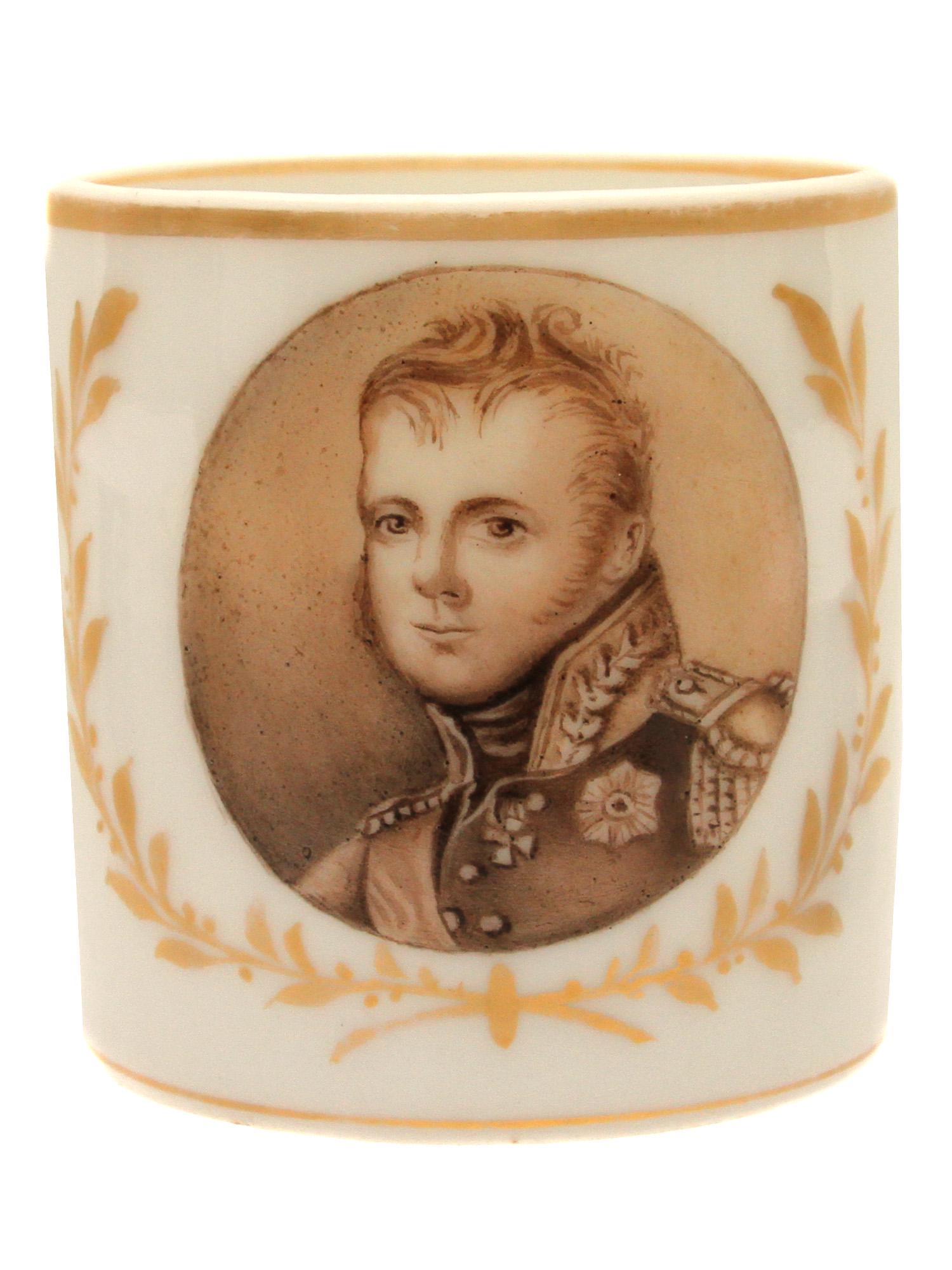 EARLY RUSSIAN GARDNER PORCELAIN ALEXANDER I CUP: An early Imperial Russian porcelain hand painted cup depicting Emperor Alexander I. Marked on the bottom in blue in under glaze. Ca. 1820. Dimensions: H: 2 1/2 in., (6.5 cm.)
