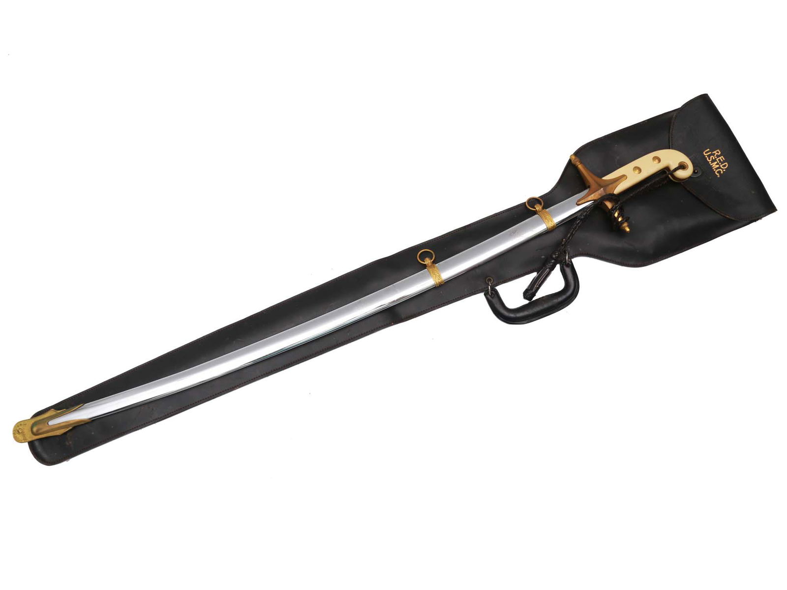 AMERICAN USMC OFFICER SWORD MAMELUKE: Personalized etched blade with "USMC SEROAL NO. 323" on the spine name "JONATHAN P. FORD" and "UNITED STATES MARINES" are etched on the blade, brass cross guard and scabbard fittings. Complete with le