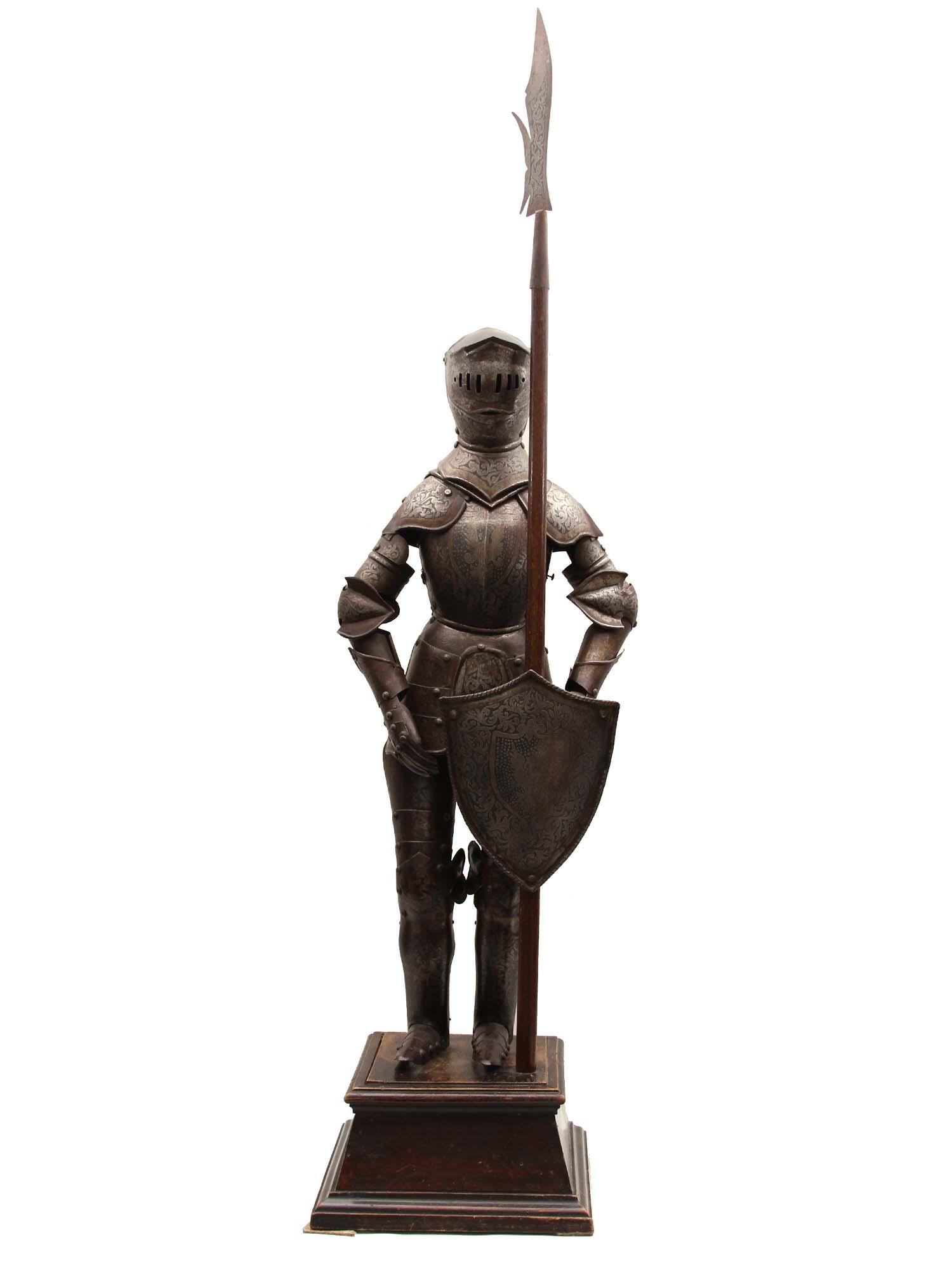 A SET OF VICTORIAN ERA GERMAN MEDIEVAL ARMOR: A nice engraved and etched set of German Medieval armor mounted on wooden base. The set came from a private collection in Italy. Dimensions: H: 54 in., (137.16 cm.)