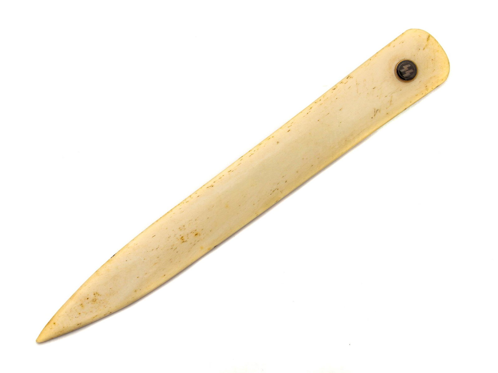 A RARE GERMAN WW2 LEIBSTANDARTE SS LETTER OPENER: A carved dagger-shaped bone, with enameled "SS" runic lightning bolts on one side and "Leibstandarte SS" insignia on the reverse (appears to be silver). 1st SS Panzer Division ("Leibstandarte SS Adolf