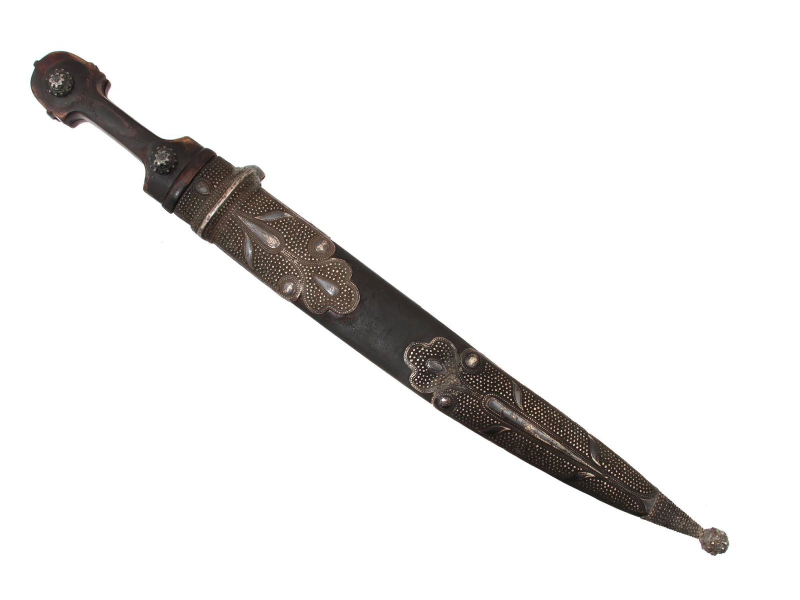A CAUCASIAN DAGGER BEBUT IN SILVER MOUNTS: With a flattened diamond section curved blade with a nice steel pattern, a characteristic form hilt, and a silver-mounted scabbard. Dimensions: L: 16 1/2 in., (42 cm.)