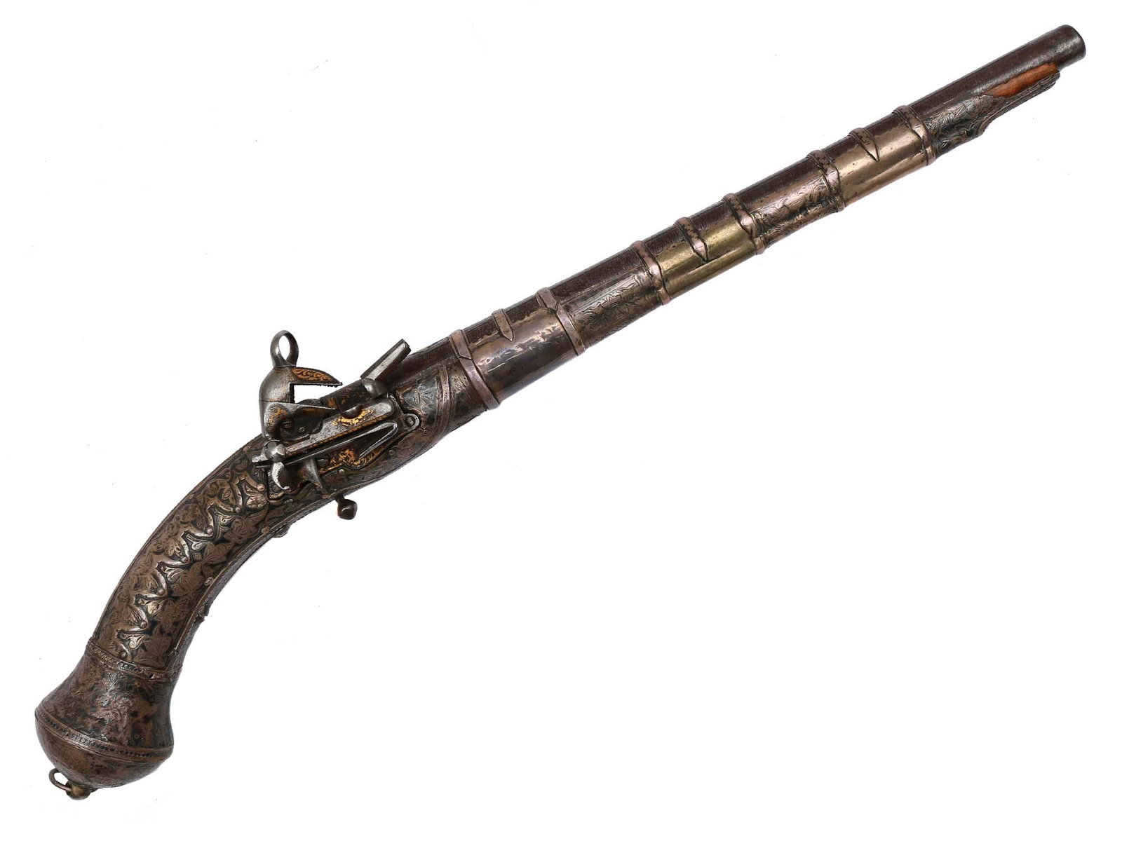 A CAUCASIAN FLINTLOCK SILVER-MOUNTED PIRSTOL: The flintlock is decorated with gold inlay, a Damascus steel round smoothbore barrel is chiseled and decorated with gold inlay (partially lost), a silver-mounted stock with engraving and niello finish