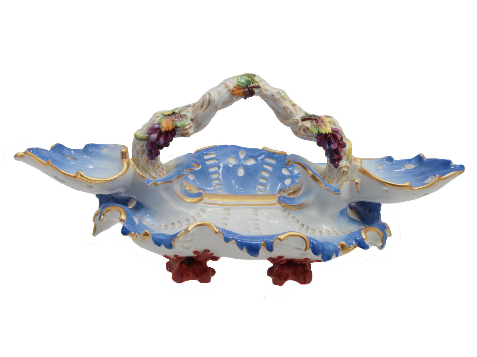 A RUSSIAN NI PORCELAIN FACTORY CENTERPIECE 19TH C: An elegant antique rococo centerpiece. The centerpiece is painted in white and blue tones, decorated with gilding and a cut-through pattern. The handle is decorated with relief images of grape bunches