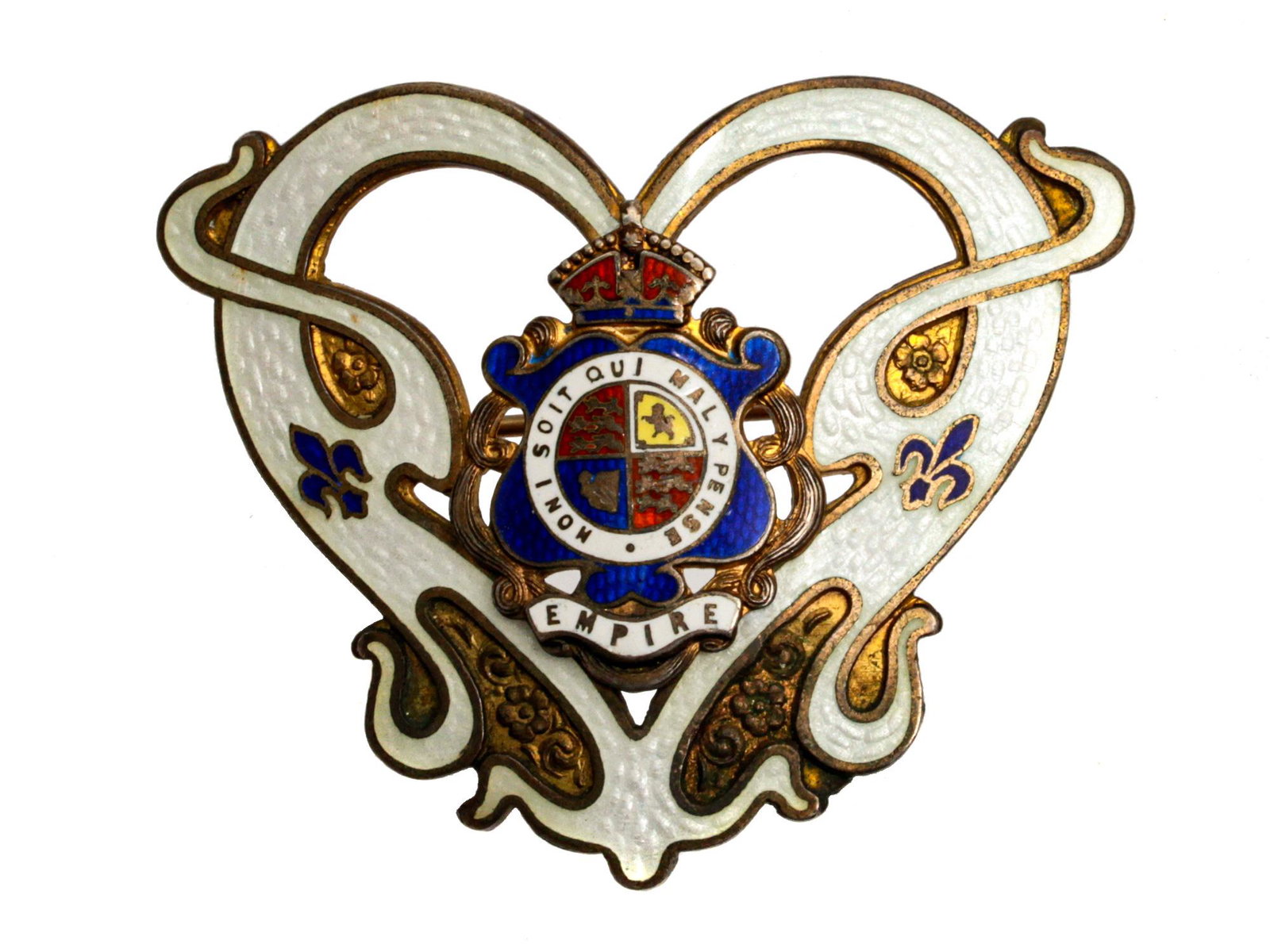 AN ANTIQUE SILVER PIN HONI SOIT QUI MAL Y PENSE: A British gilt-silver and enamel award pin made in the Art Nouveau style. The obverse bears the motto of the Order of the Garter: Honi soit qui mal y pense (shame on anyone who thinks evil of it). On 