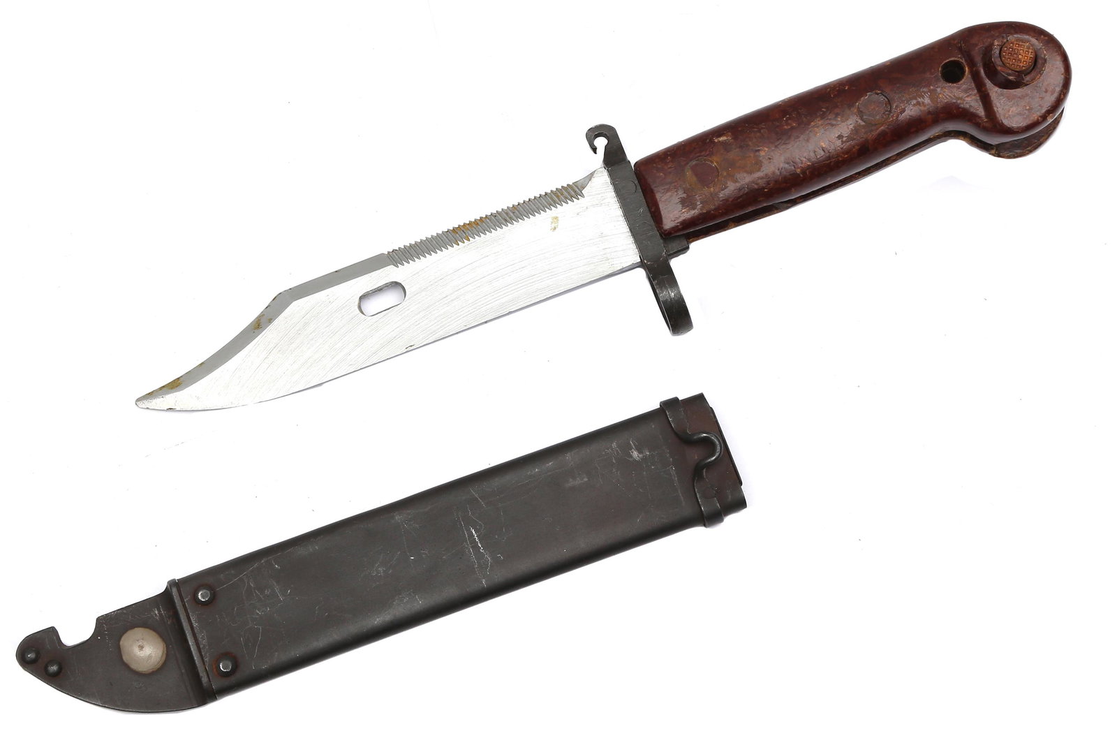 A SOVIET ROMANIAN AK47 KALASHNIKOV ARMY BAYONET: Bakelite handle, and metal scabbard marked with matching S/N SAD0039. Dimensions: L: 13 in., (33 cm.)