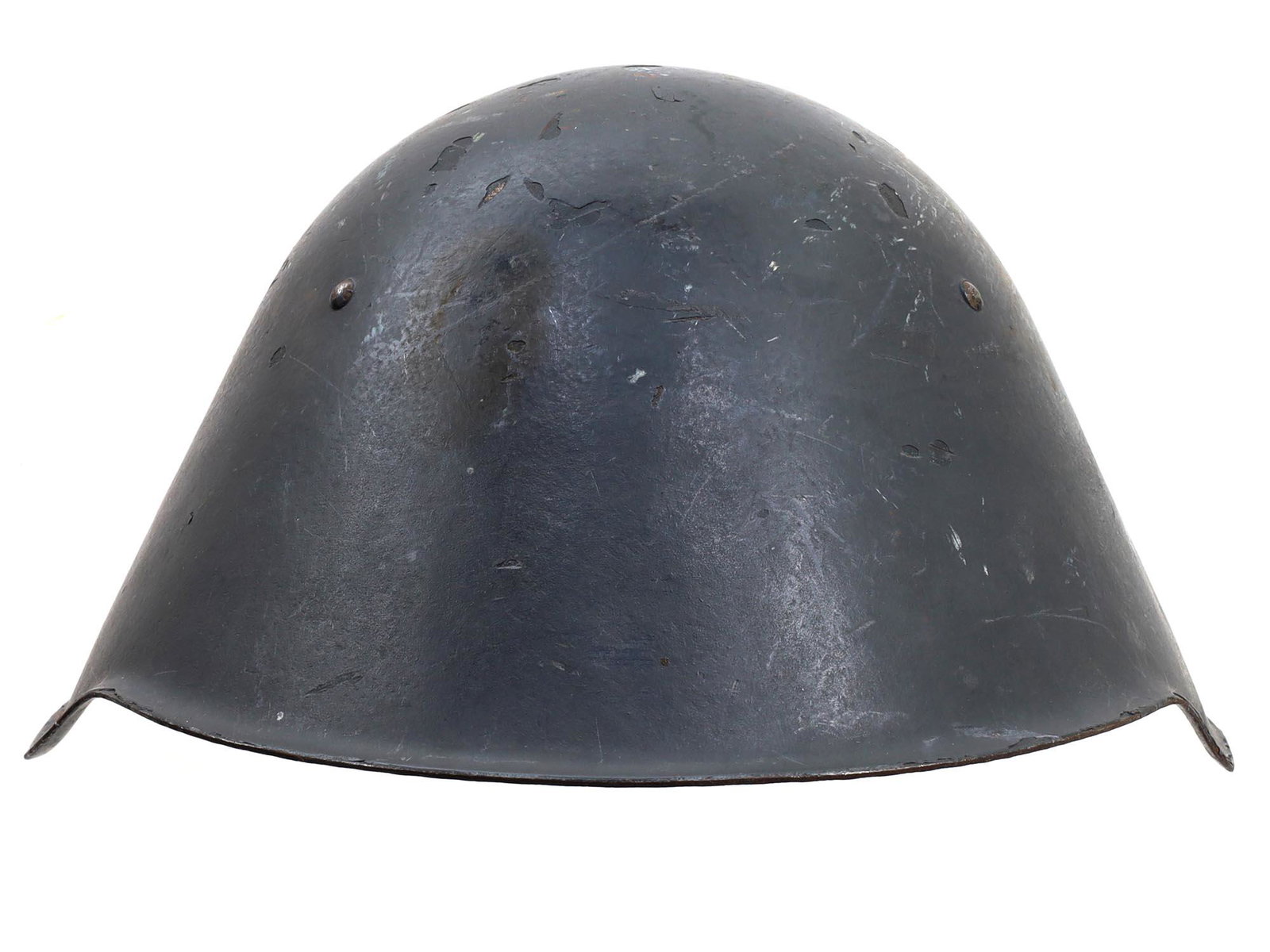 AN EAST GERMAN DDR COMBAT HELMET, 1956: Early issue M56 steel helmet with metal headband, leather lining sweatband and leather chinstraps are missing.