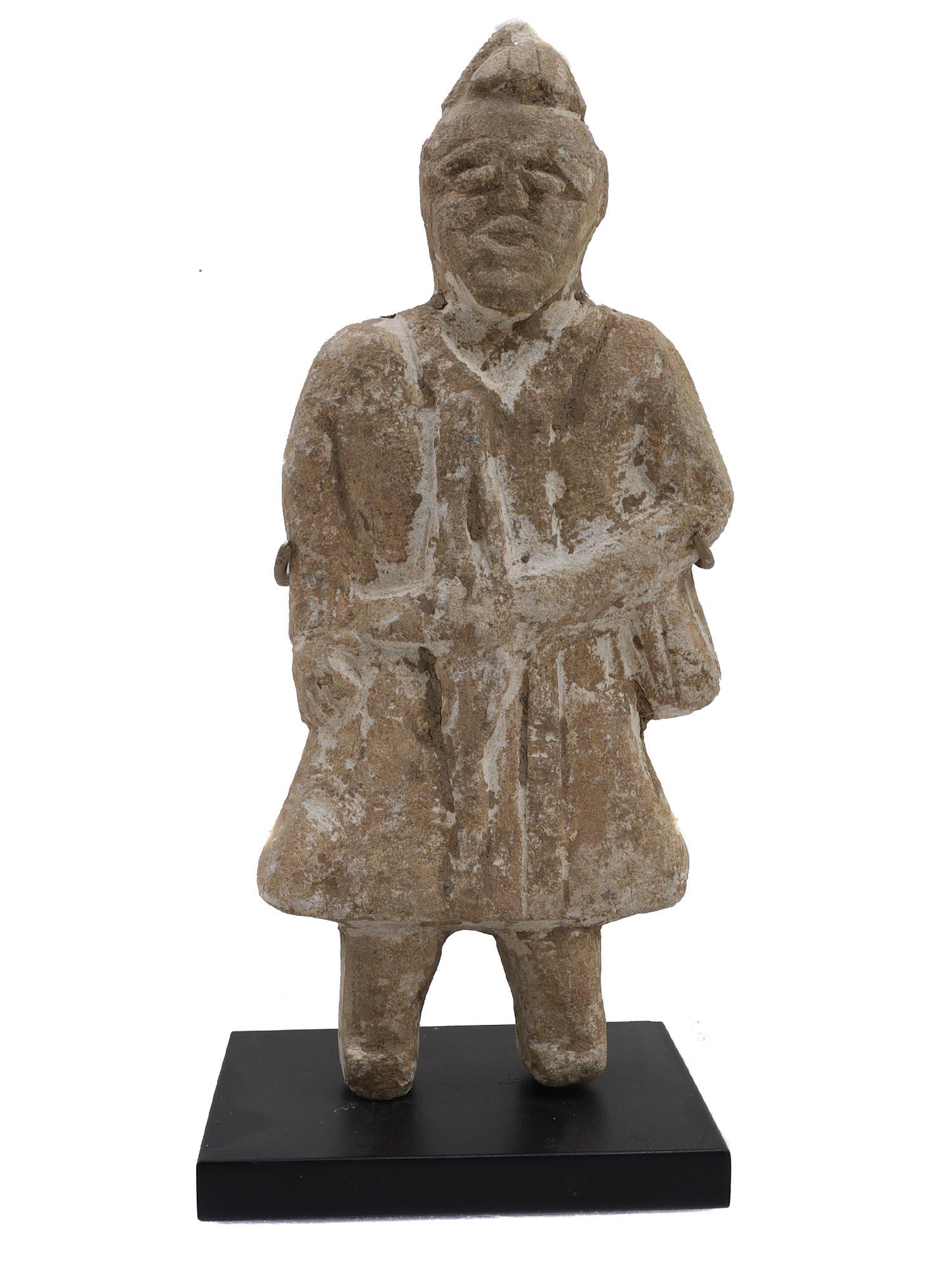 AN ANTIQUE ISLAMIC STATUE OF A MAN, 13TH CEN. (1 of 3)