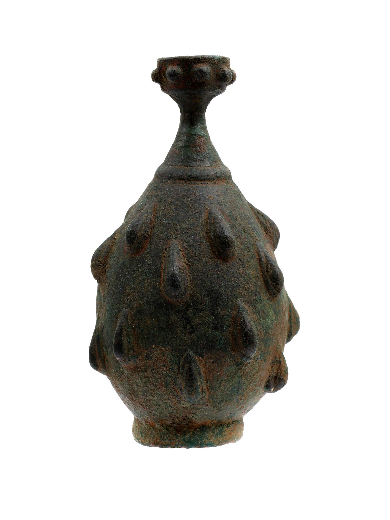 AN ANTIQUE ISLAMIC PERSIAN BRONZE BOTTLE, 10TH C. (1 of 3)