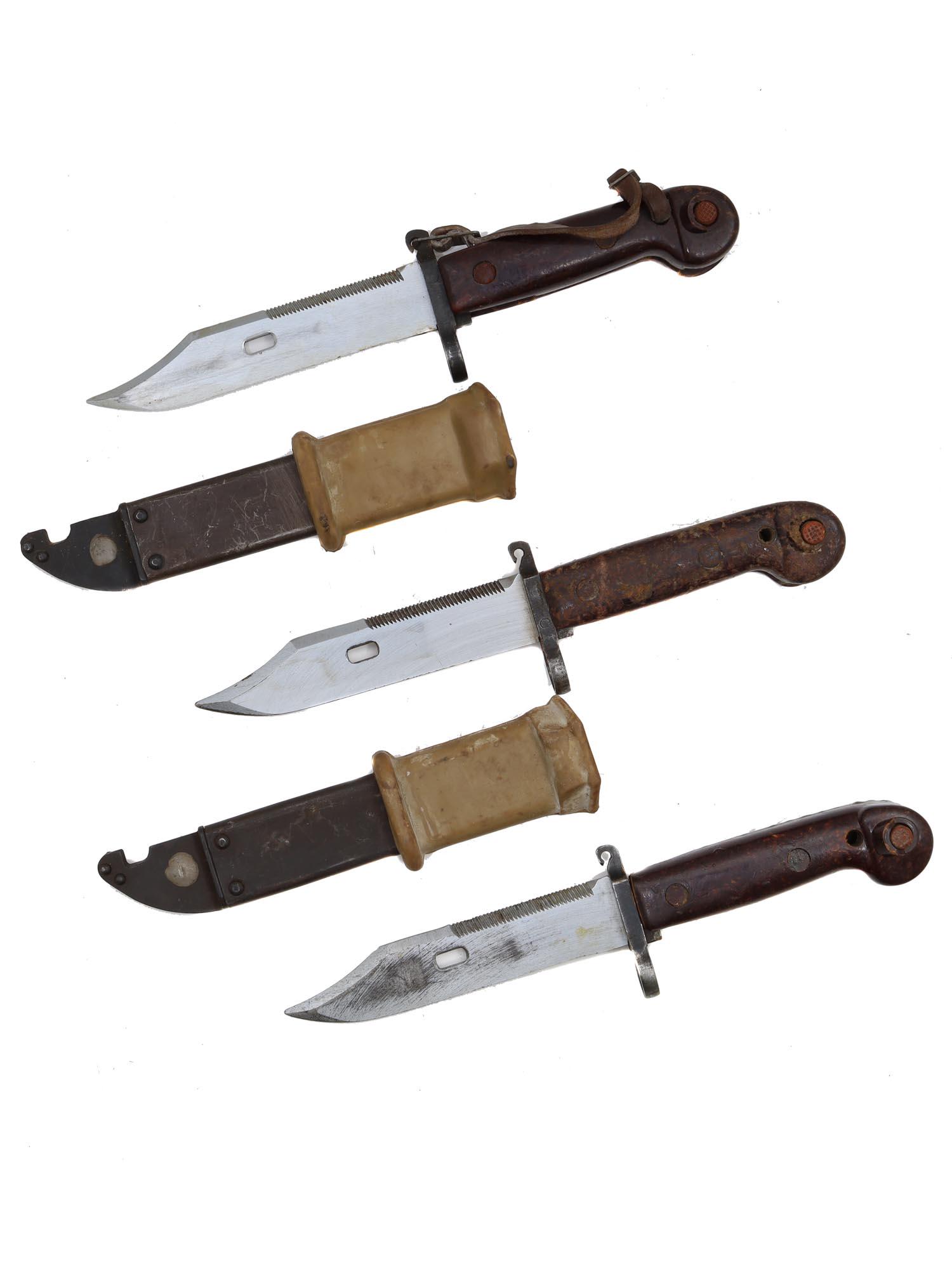 A LOT OF THREE SOVIET ROMANIAN KALASHNIKOV AKM BAYONETS: Three AKM Kalashnikov bayonets, all bear engraved serial numbers and factory marks. One bayonet scabbard is missing. Dimensions: L: 13 in., (33 cm.)