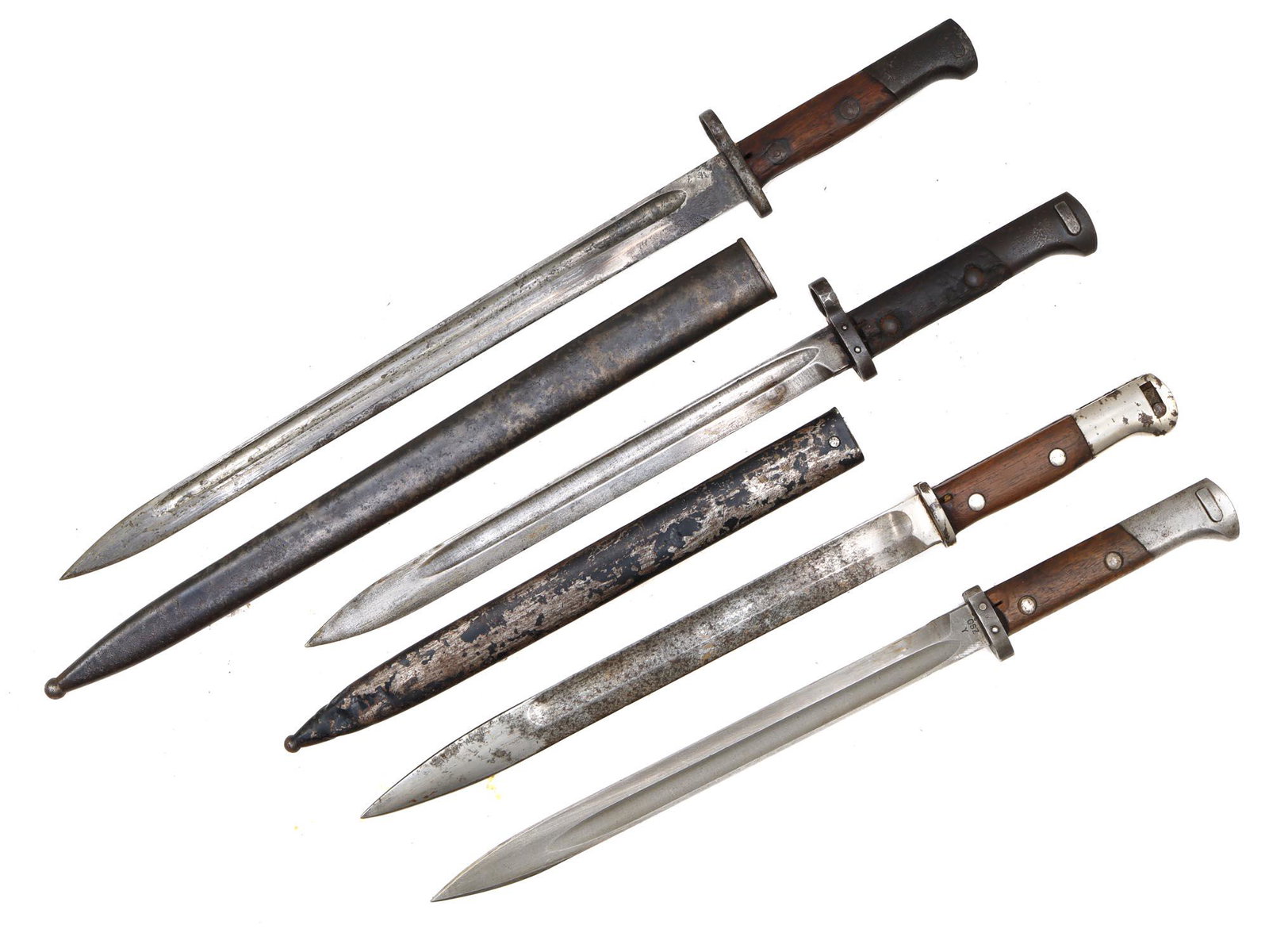 A LOT OF FOUR MAUSER BAYONETS YUGOSLAVIAN AND CZECH: This lot consists of one Yugoslavian M1924 bayonet for Mauser 1912/14 rifle, and three Czechoslovakian VZ-24 bayonets for the 8 mm. Mauser VZ. 24 rifle; All bayonets bears factory inspection marks. Tw