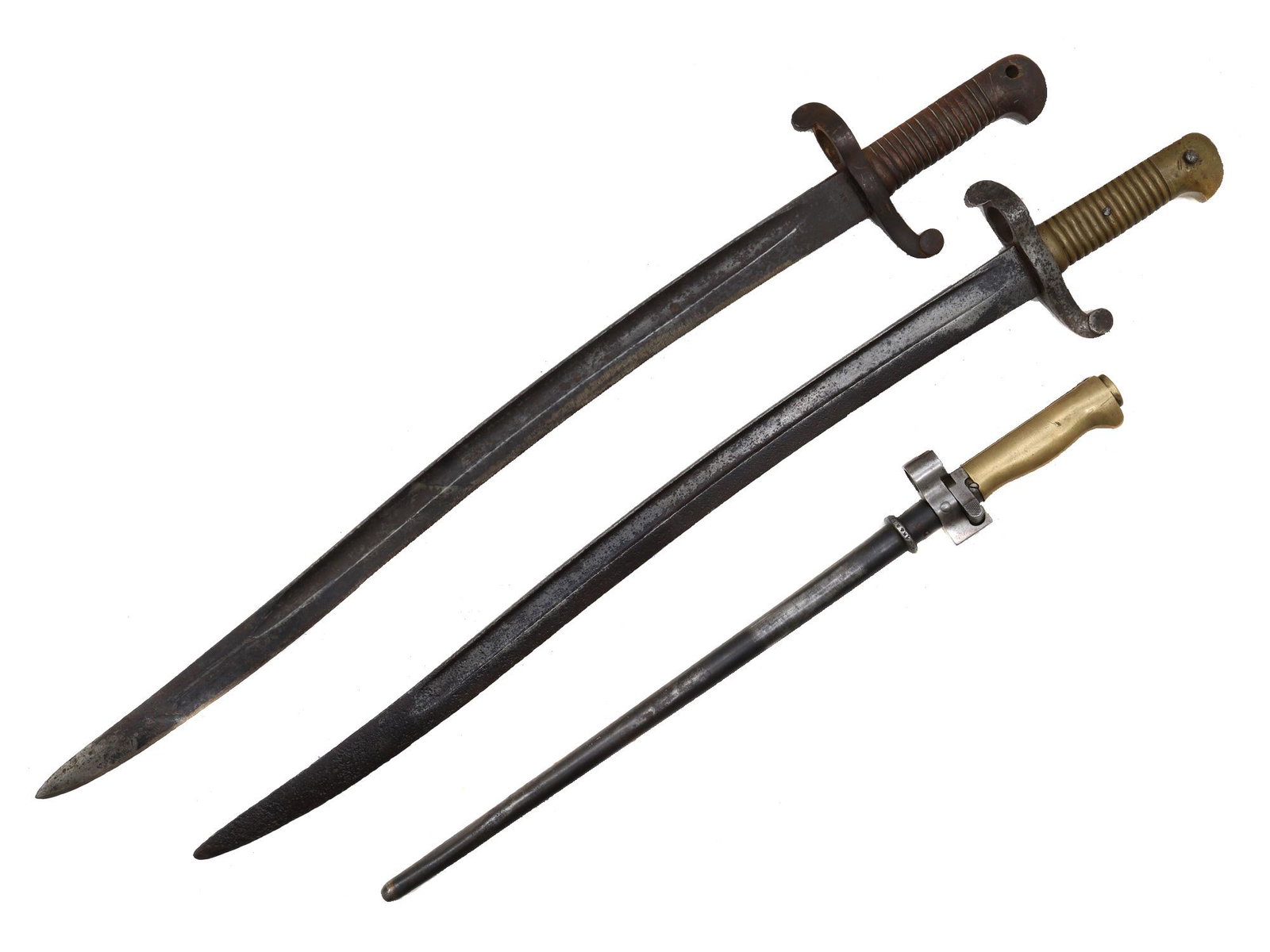 A LOT OF TWO BAYONETS - 24: Lot of 3 French bayonets:1. and 2. French bayonets, model 1842/1859, without scabbard.3. French bayonet model 1886/16/35 for the Berthier system rifle, with scabbard.Bayonets have the manufacturer mar