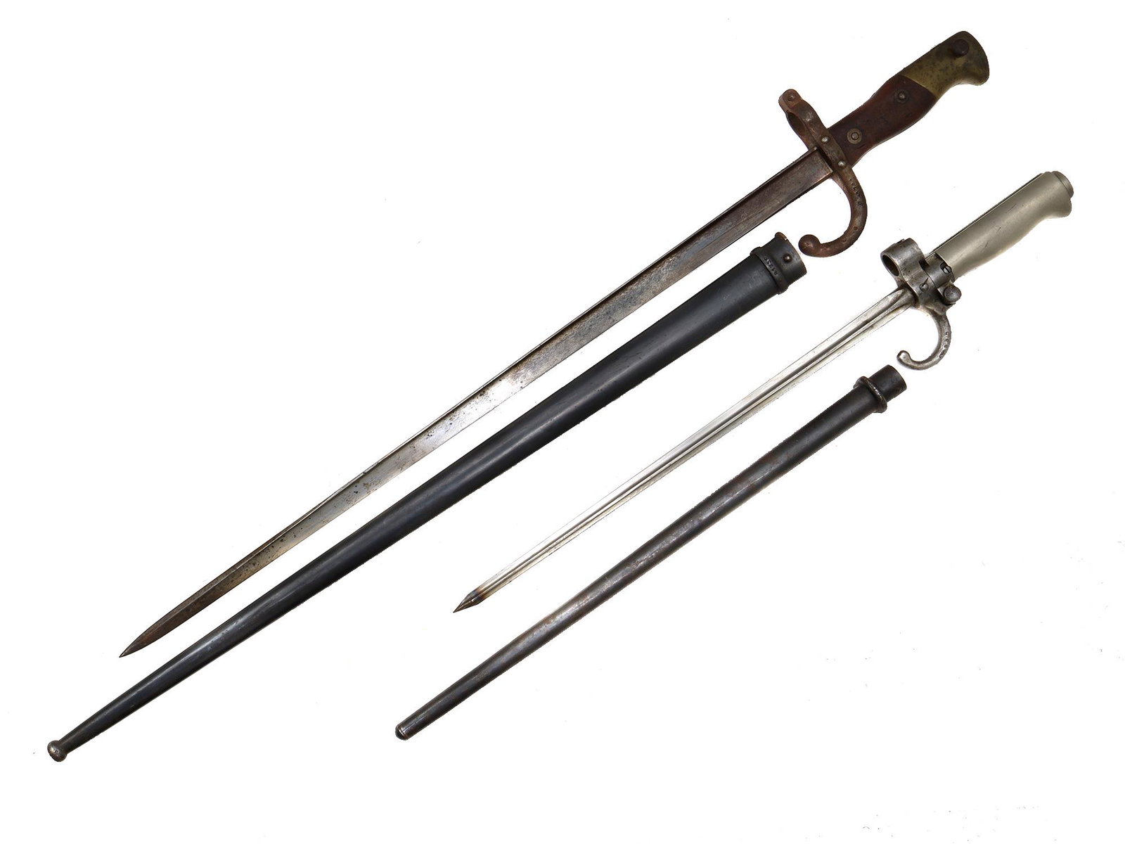 A LOT OF TWO FRENCH BAYONETS, 19TH CEN.: Lot of 3 bayonets from left to right1. A French bayonet model 1874 for a Gra system rifle, with a scabbard.2. A French bayonet model 1886/16/35 for the Berthier system rifle, with scabbard.3. An Engli