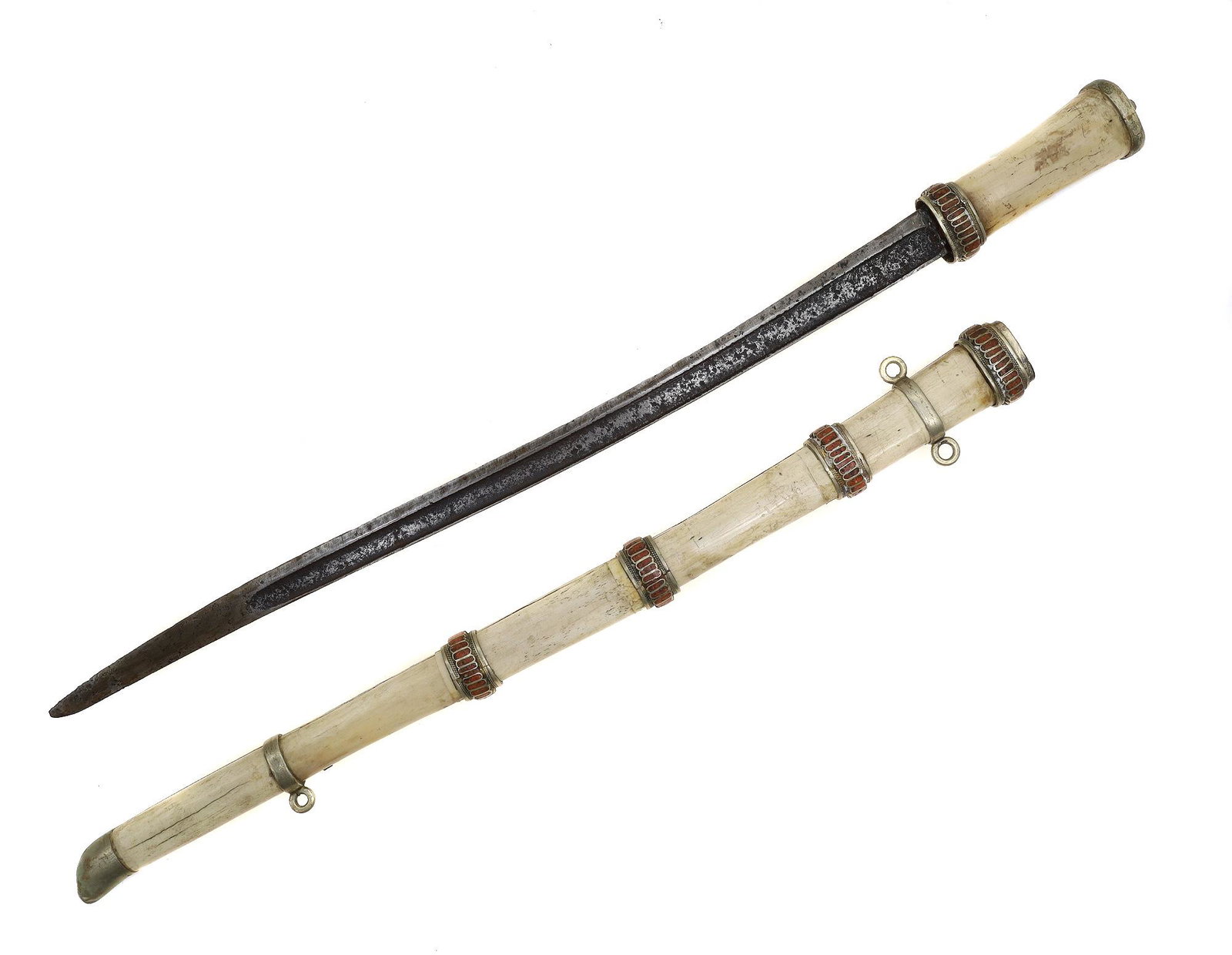 A RARE NORTH AFRICAN SWORD CORAL WITH CORALS, 19TH CEN.: A North-African sword with re-curved, single-edge pointy blade, carved bone handle and scabbard set with corals.Late 19th cen. Dimensions: L: 27 1/2 in., (70 cm.)