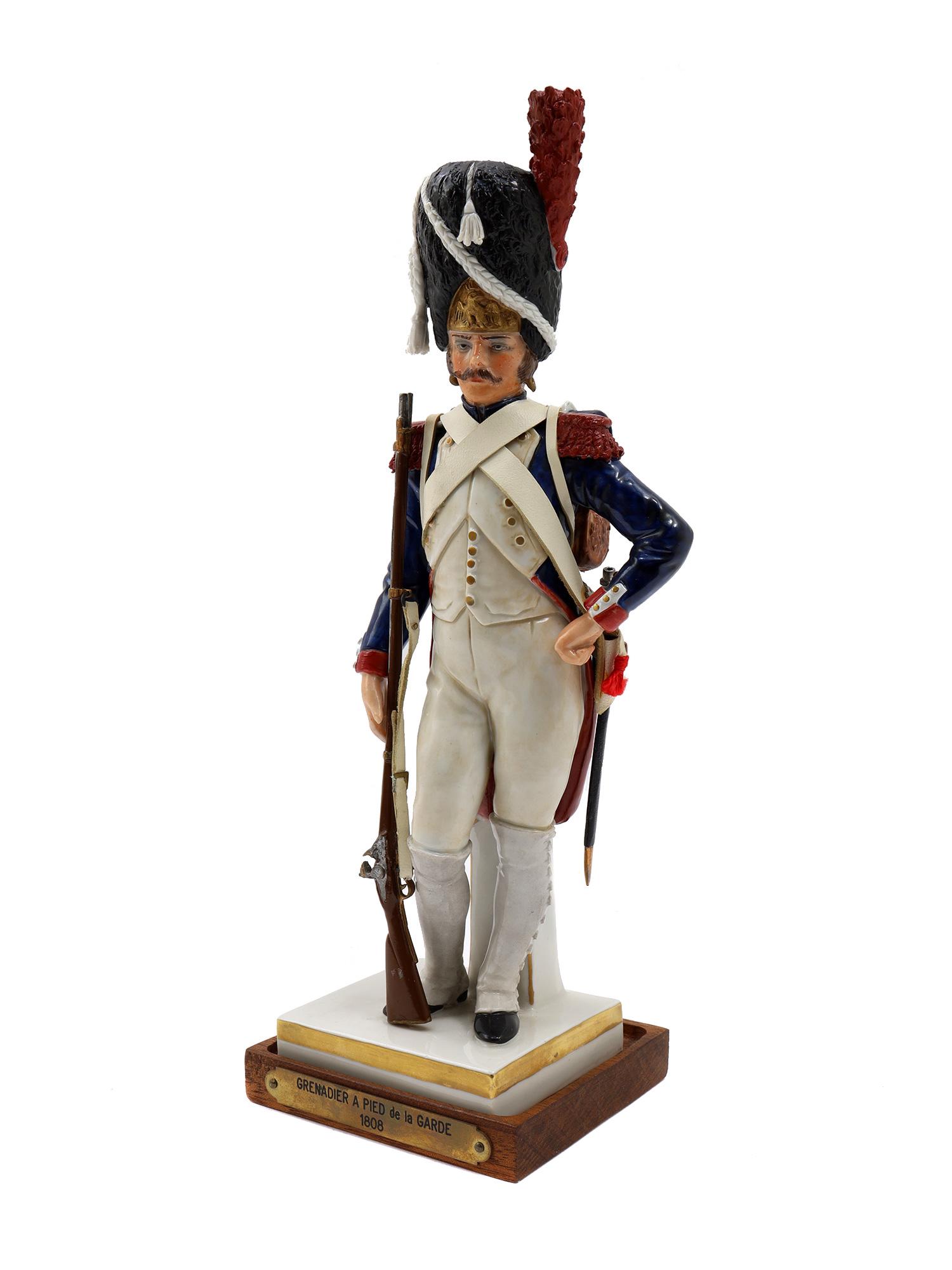 A VAN GERDINGE NAPOLEONIC PORCELAIN FIGURINE OF A GUARD (1 of 5)
