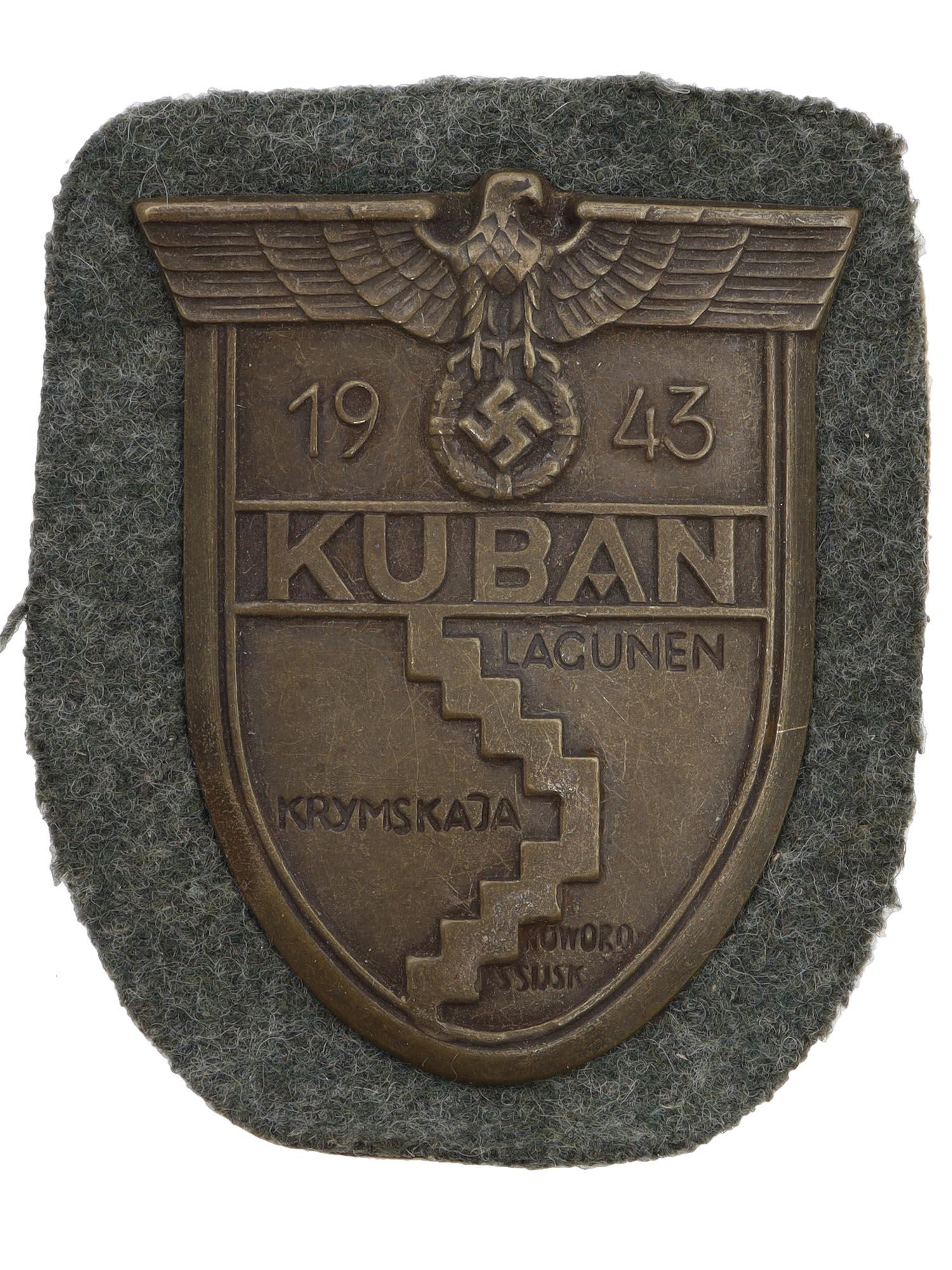 A WWII GERMAN KUBAN SLEEVE SHIELD BADGE, AWARDED IN 1943 (1 of 2)