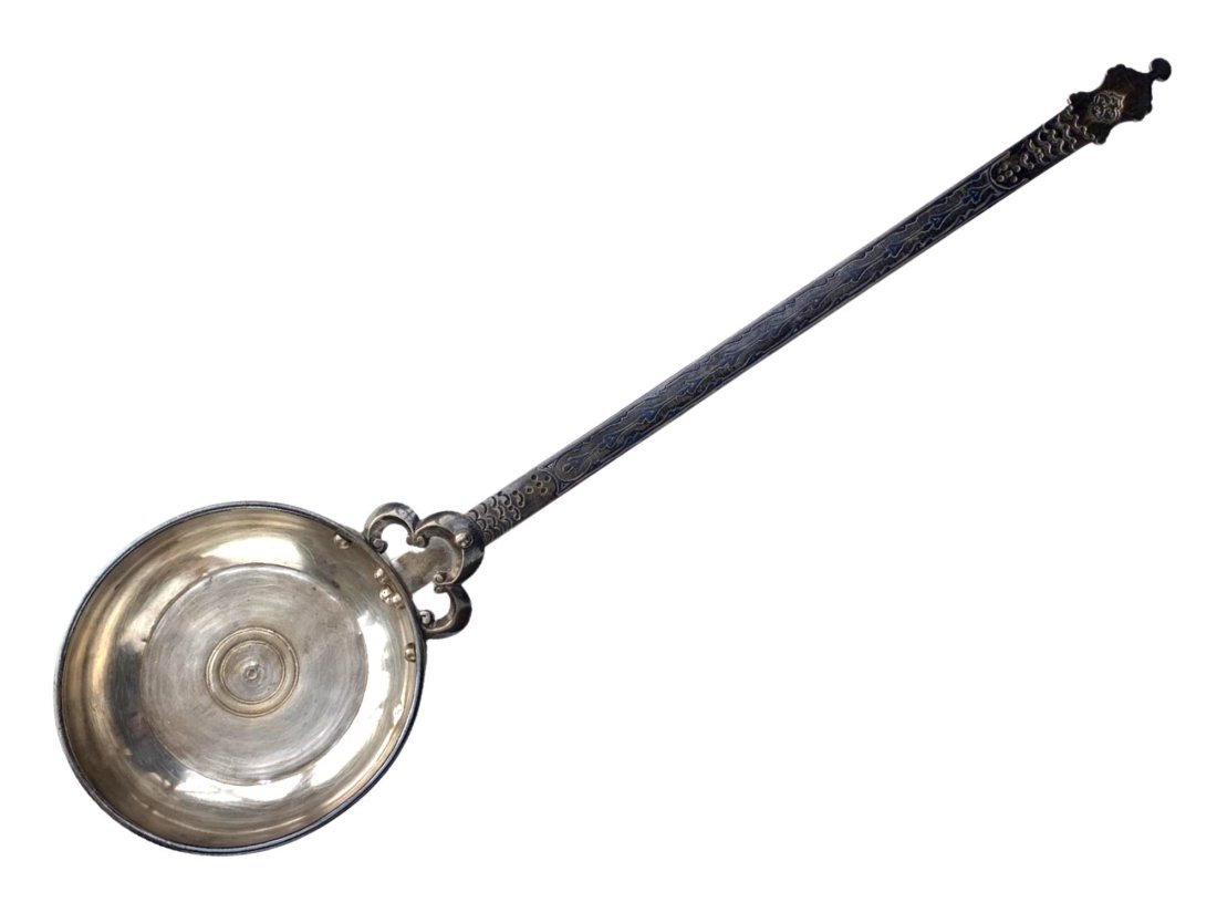 A RARE CAUCASIAN GEORGIAN SILVER WINE LADLE, 19TH CEN.: An antique silver niello richly decorated Georgian wine ladle called "azerpesha". Dated and stamped.19th century. Weight: 10.5 o., 297 g. Dimensions: L: 15 1/2 in., (39.5 cm.)
