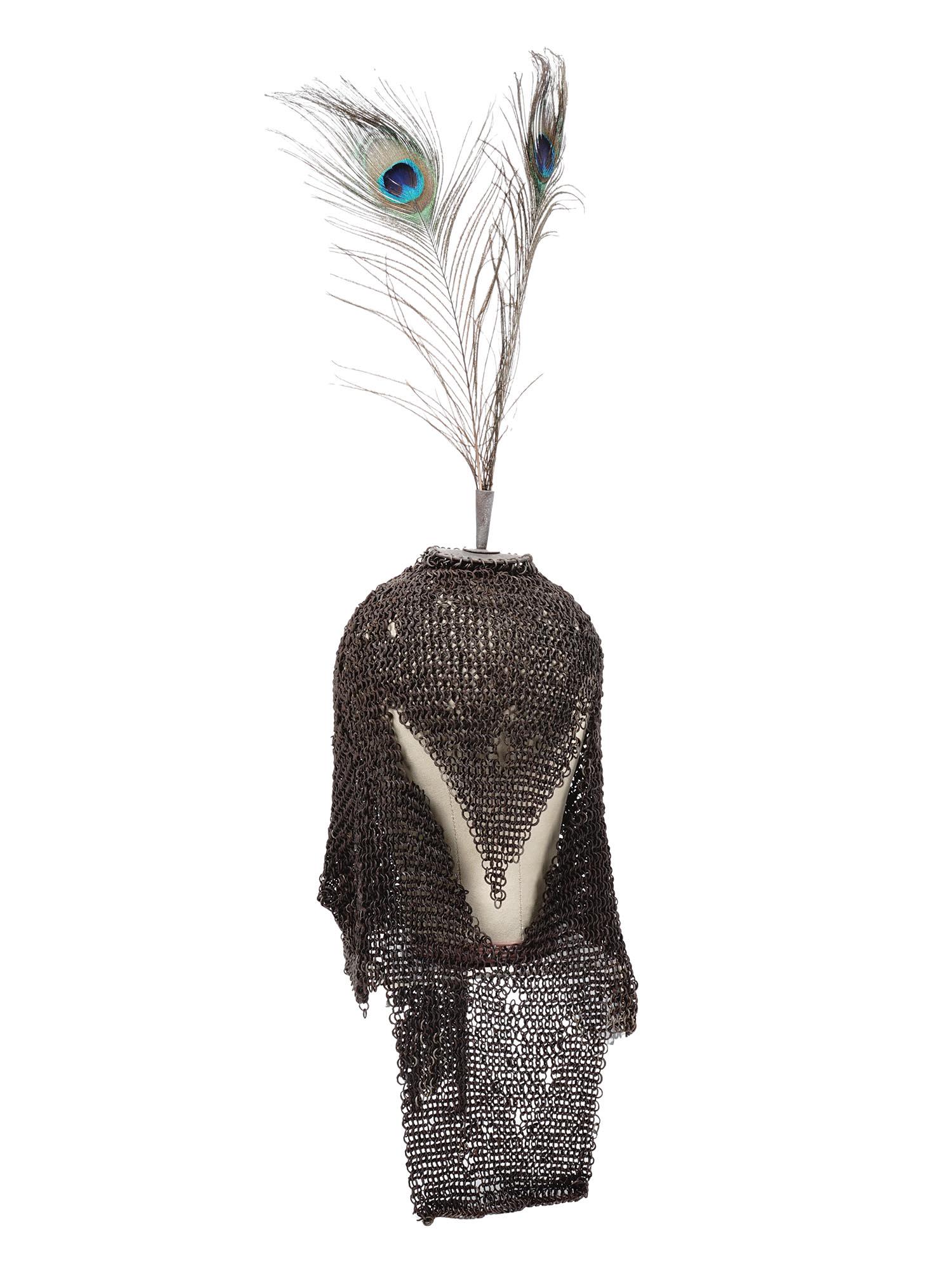 AN ANTIQUE INDO-PERSIAN MAIL COIF HELMET KULAH ZIRAH: An antique Mughal Indo-Persian Islamic mail coif helmet, or a kulah zirah, is formed of small hand-forged, riveted, and butted iron rings forming a hood covering the entire head and suspended from a c