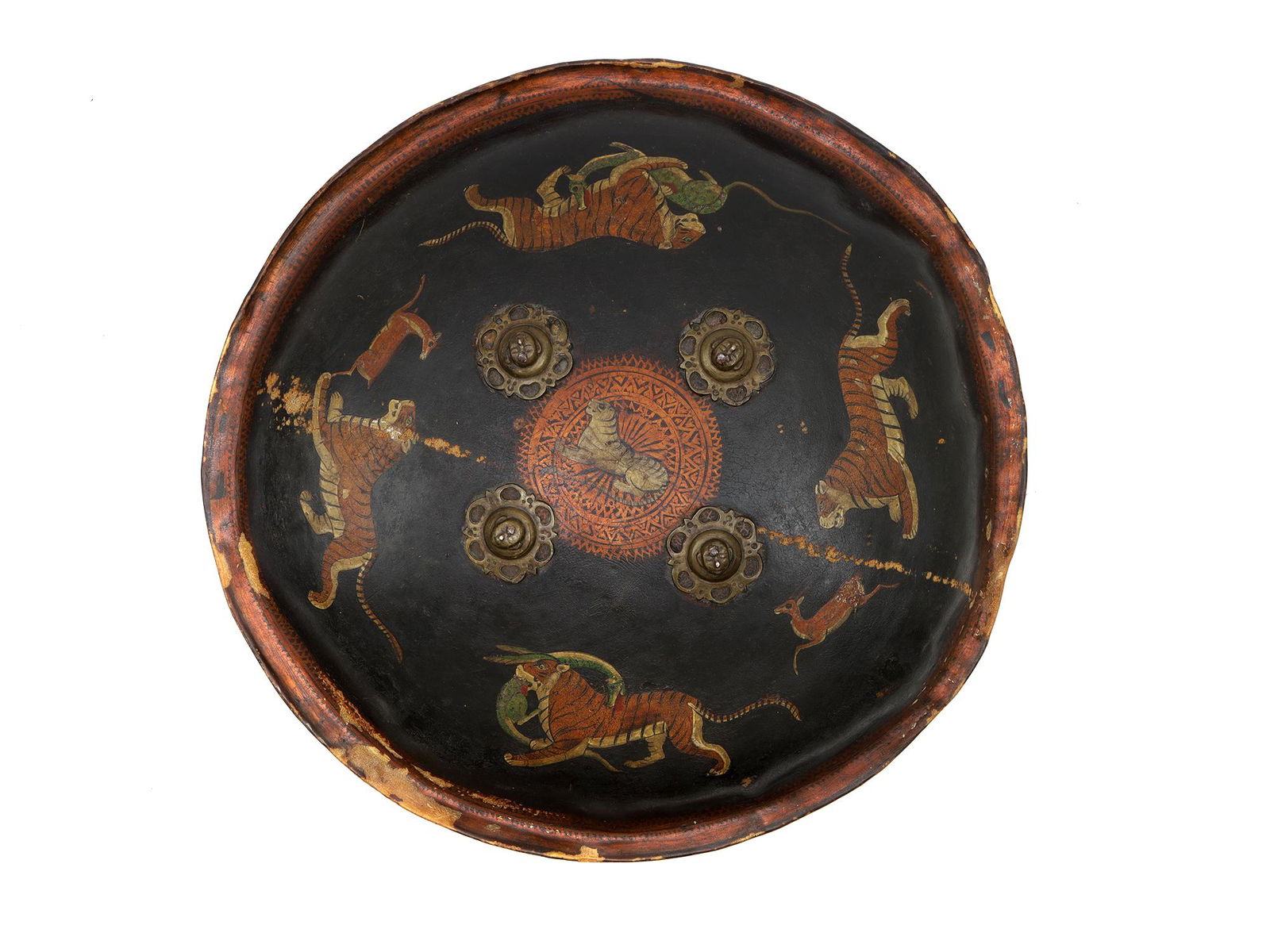 A HAND-PAINTED INDIAN DHAL SHIELD WITH TIGERS, 19TH CEN.: A hand-painted Indian shield (dhal), Rajasthan, 19th century. Made of leather, of convex circular shape, provided with a raised border. The entire surface is painted in polychrome with Tigers that hun
