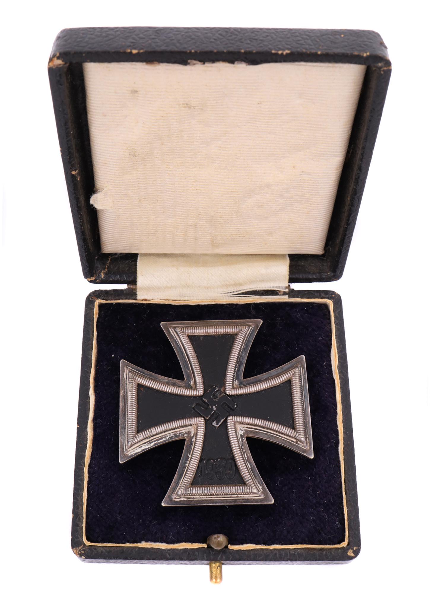A CASED NAZI GERMAN WW2 IRON CROSS BADGE FIRST CLASS: A Nazi German WW2 Iron Cross Badge of the 1st class. The obverse of the award features an embossed, central, canted swastika with the reinstitution date 1939, to the bottom arm. The swastika is in nic