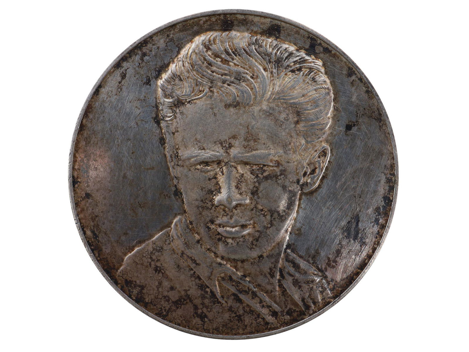 A JAMES DEAN EAST OF EDEN COMMEMORATIVE COIN: On the obverse, there is a portrait of the famous American actor James Dean. On the reverse there is an image of a Porsche 550 Spyder car and a laurel branch, the inscription on the top: "James Dean 8