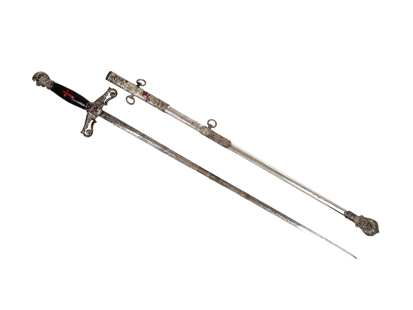 A KNIGHTS TEMPLAR MASONIC SWORD, LATE 19TH EARLY 20TH C.: Masonic sword for the "Knights Templar" order ceremony, with scabbard, offered to William Tomas Walters, late 19th early 20th century. The pommel is in the form of a knight's helmet, and the hilt is b