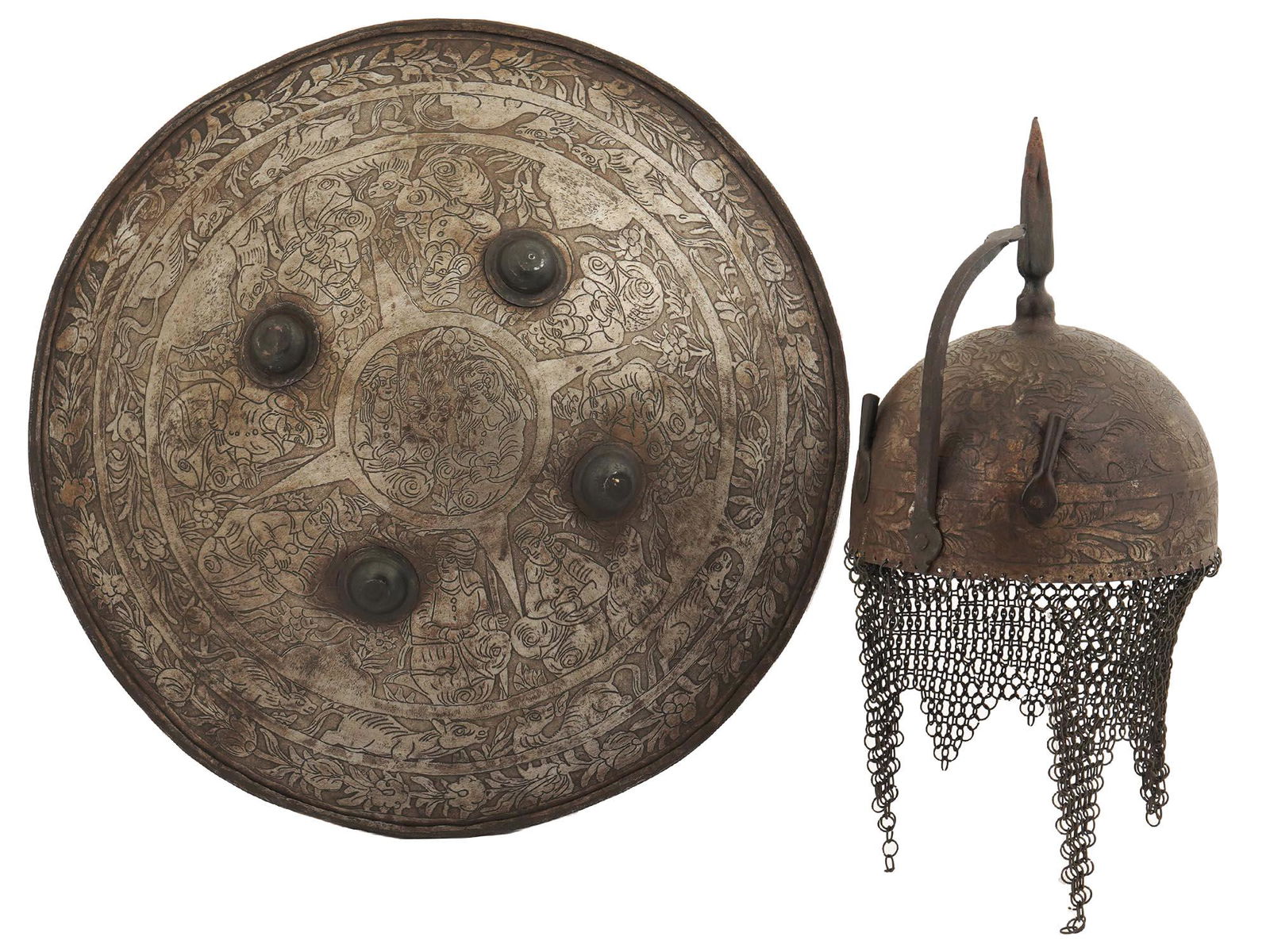 AN INDO-PERSIAN DHAL SHIELD SNA KHULA-KHUD HELMET, 19TH C.: A matching set consisting of a ceremonial 19th-century Indo-Perislan etched and engraved steel shield and helmet with chain mail.Late 19th - early 20th cc. Dimensions: Shield D: 19 in., (48.5 cm.)