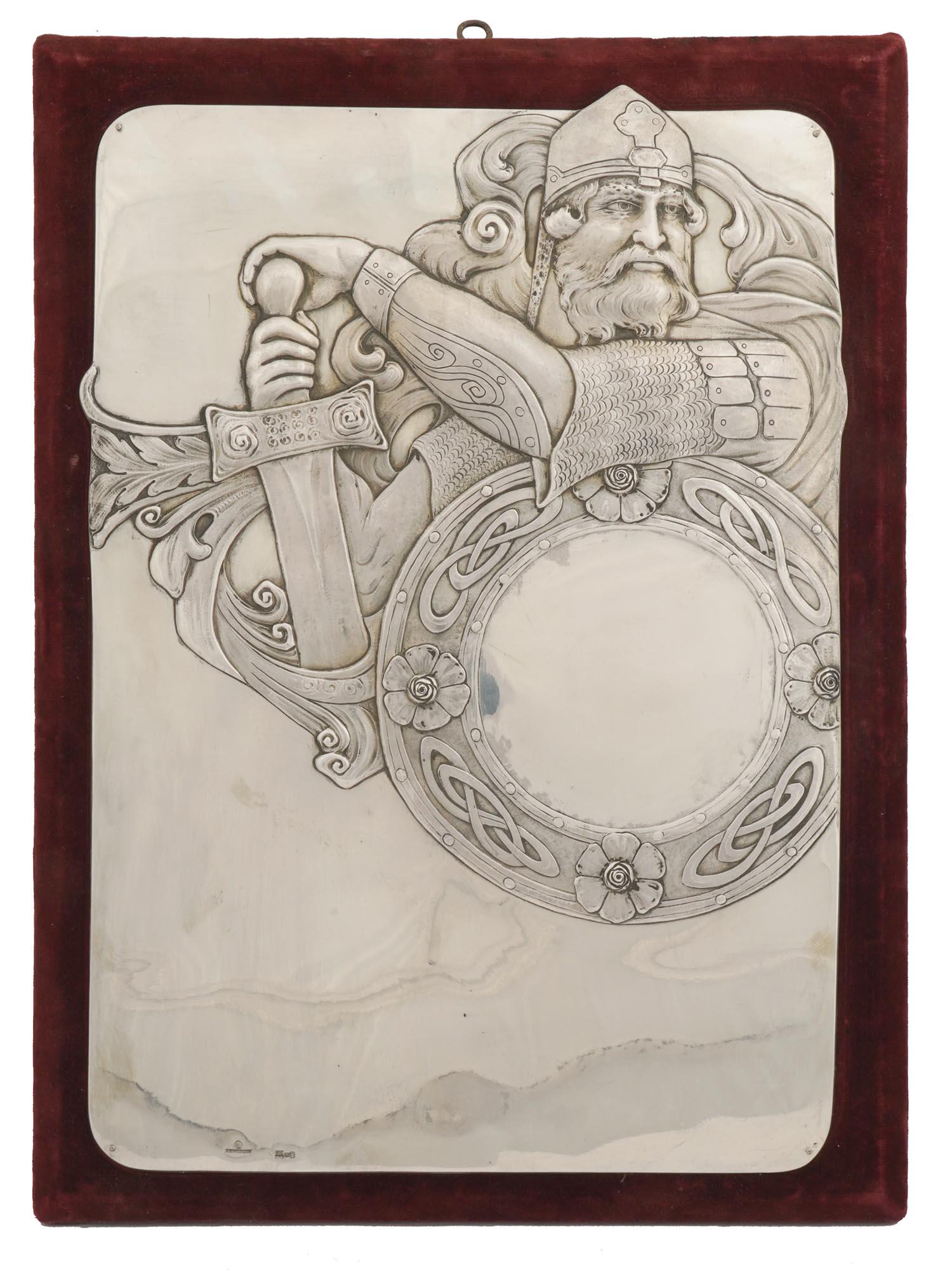 A RUSSIAN CHASED SILVER PLAQUE DEPICTING A WARRIOR, 1900 (1 of 4)
