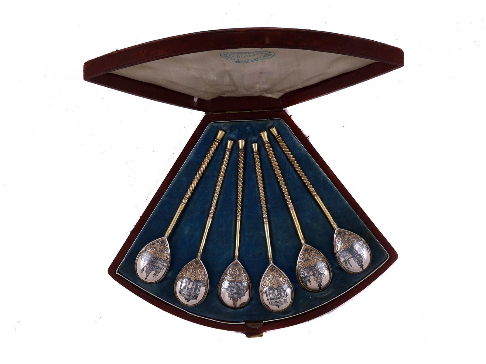 A CASED SET OF RUSSIAN PARCEL-GILT SILVER AND NIELLO SPOONS (1 of 10)