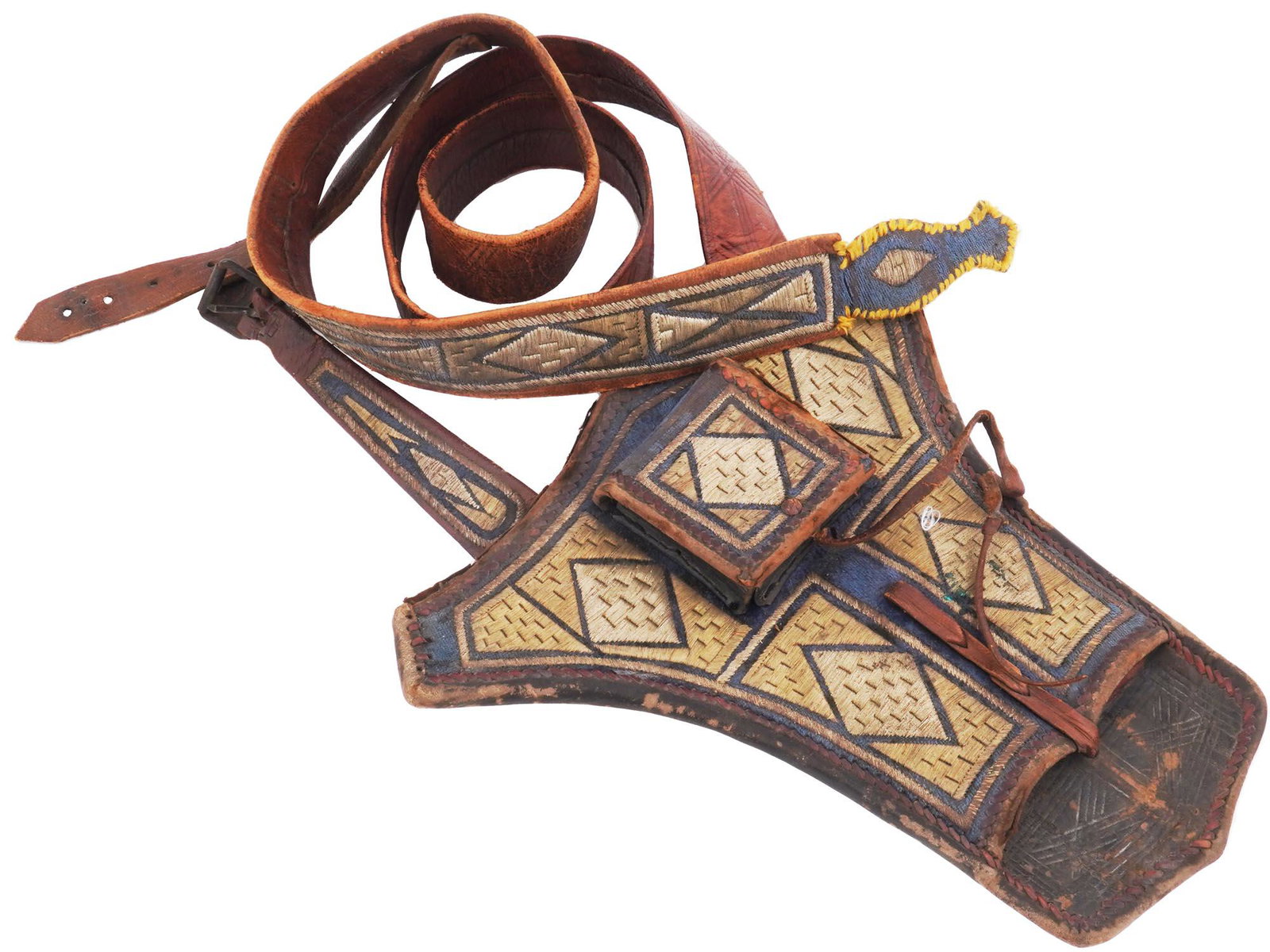 A TURKISH OTTOMAN EMPIRE EMBROIDERED PISTOL HOLSTER, 19 C.: A leather holster design for two flintlock pistols. Beautifully decorated with embroidery. The small compartment attached to the front of the holster is a pouch.Mid-19th century.