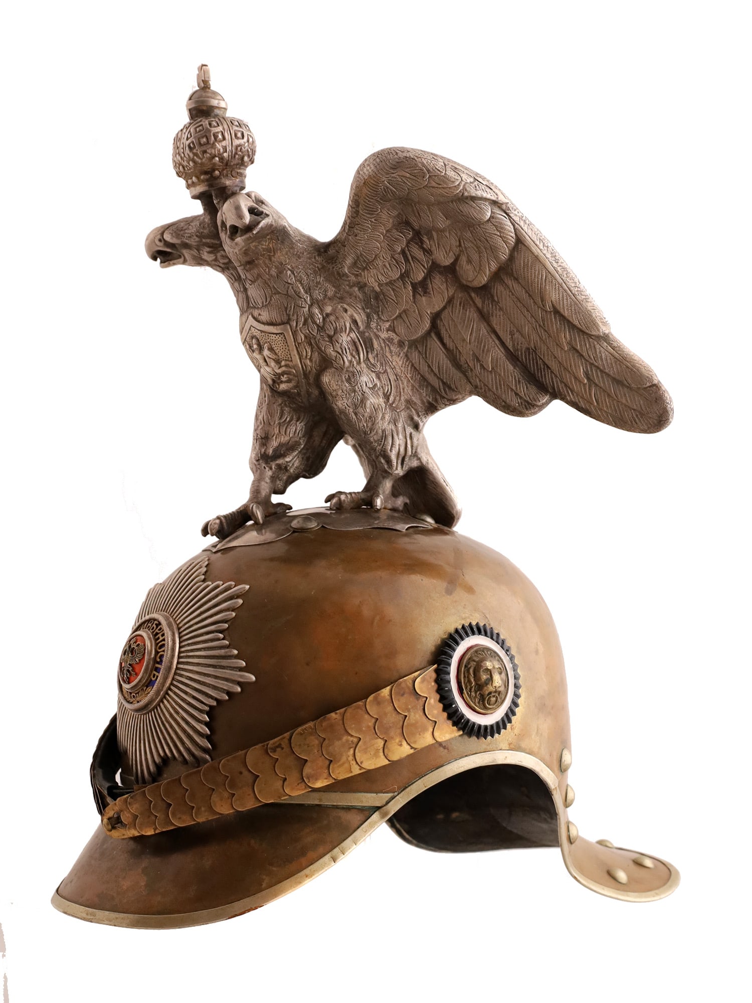 A RUSSIAN IMPERIAL GARDE DU CORPS OFFICER'S HELMET: Imperial Russian HIM Garde Du Corps helmet, reign of Nicholas II. The skull, front peak, and lobster tail are of polished brass. The helmet finial is a double-headed Russian Imperial eagle. The cocard